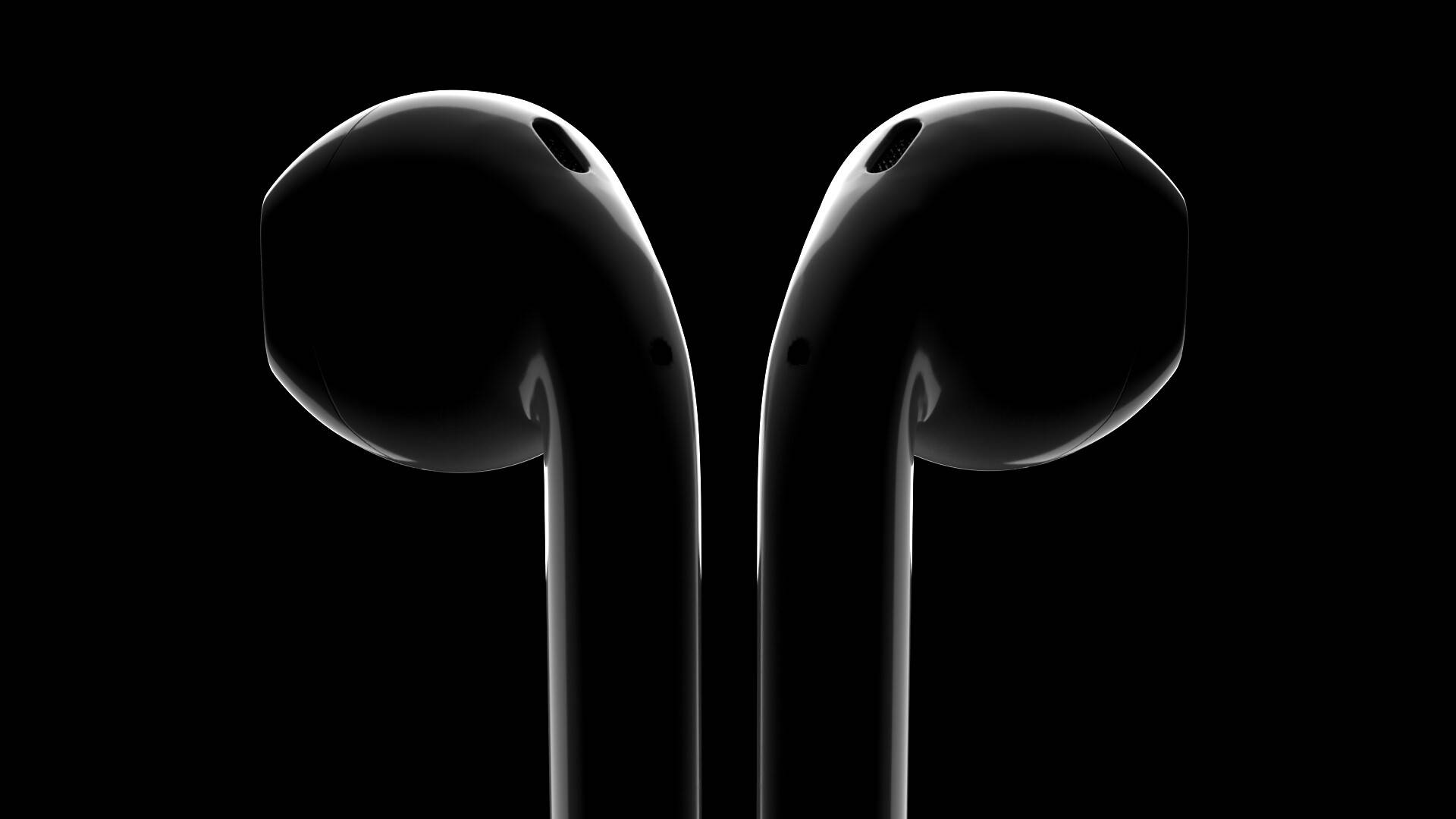 AirPods 桌布 壁紙 — 兩款時尚黑色耳塞在純黑色背景上直立，由銳利的攝影棚燈光突出。