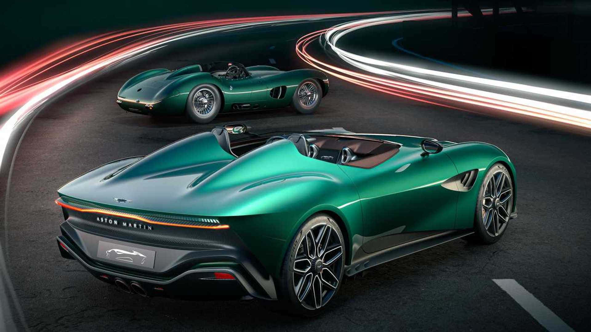 奧斯頓馬丁 桌布 壁紙 — 兩輛時尚的綠色 Aston Martin 跑車在黑暗的賽道上滑行，周圍有發光的紅色和白色光軌旋轉。