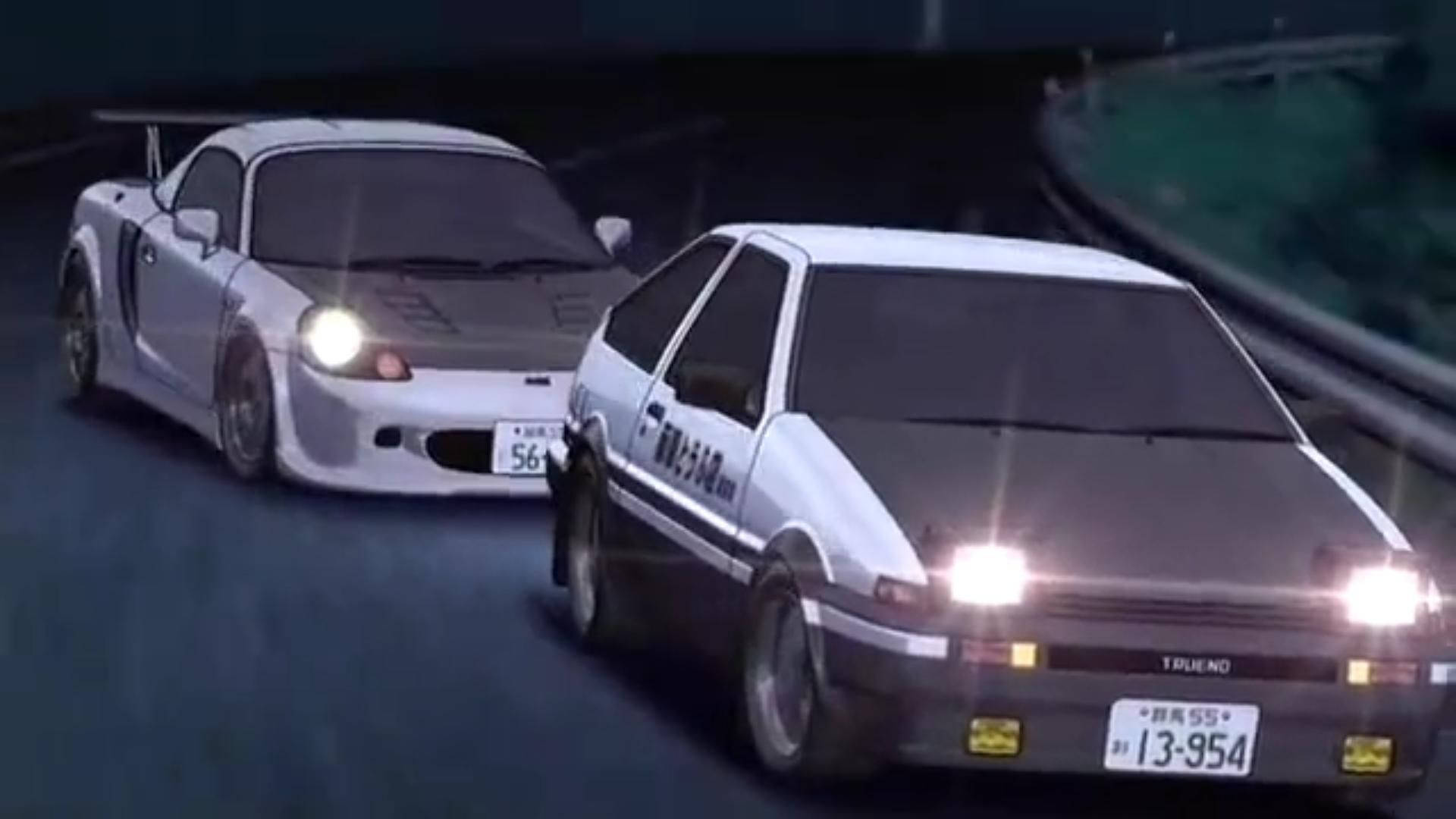 Initial 桌布 壁紙 — 兩輛白色日本甩尾車在夜間於潮濕蜿蜒的道路上奔馳，車頭燈閃爍發光。