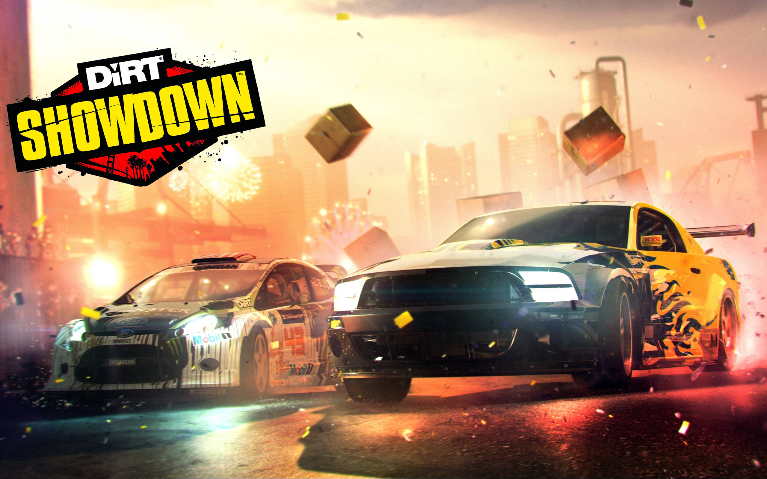 Showdown 桌布 壁紙 — 兩輛賽車在火光熊熊的城市街頭賽車中相撞，碎片四濺，霓虹燈閃爍。