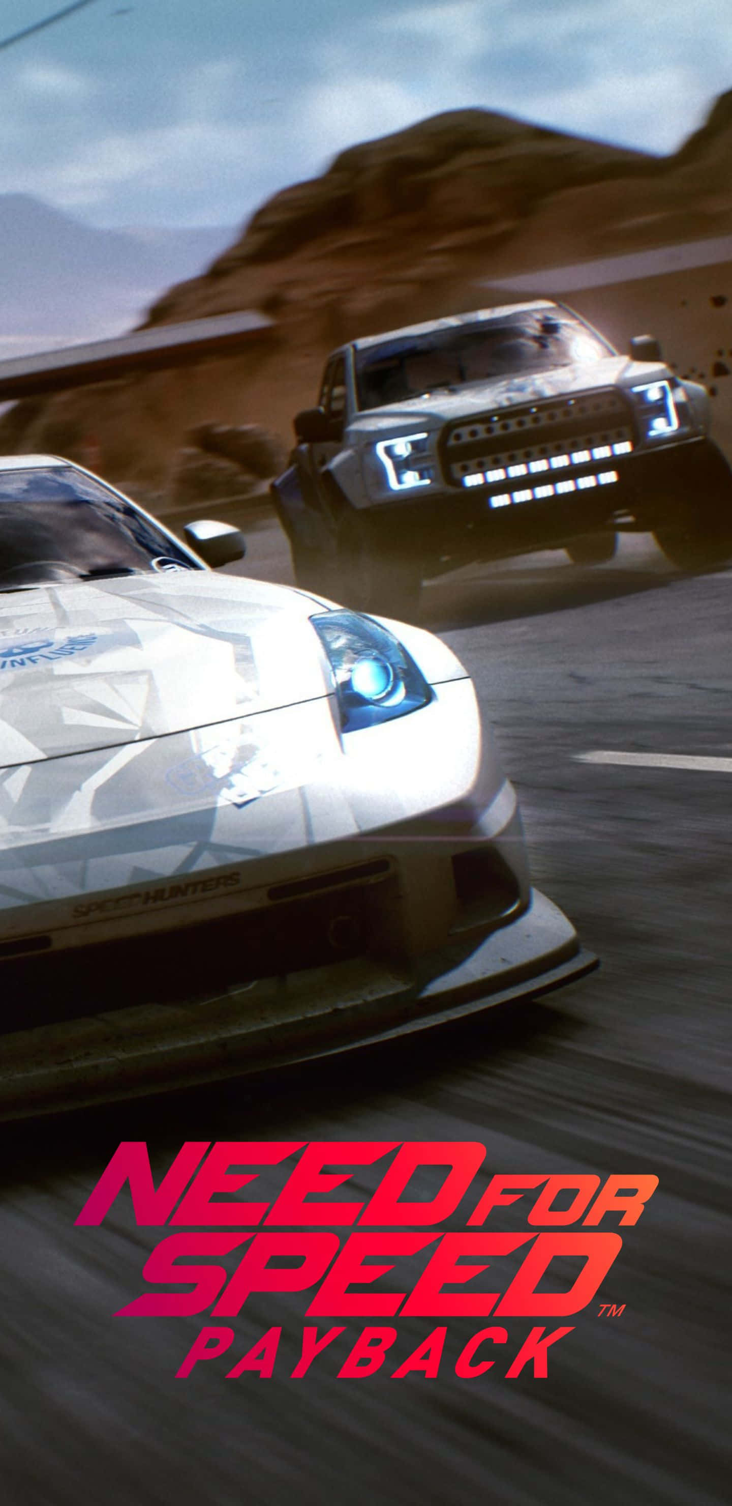 Pixel 3xl Need For Speed Payback 桌布 壁紙 — 兩輛高性能汽車在沙漠高速公路上高速競賽，塵土飛揚，光線戲劇性。