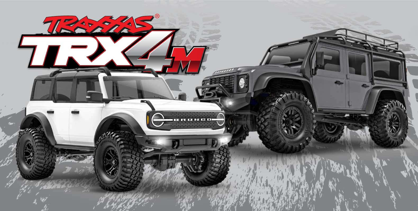 Rc Cars 桌布 壁紙 — 兩部堅固的Traxxas TRX4M遙控Bronco，配備超大輪胎和車頂架，準備好進行越野行動。