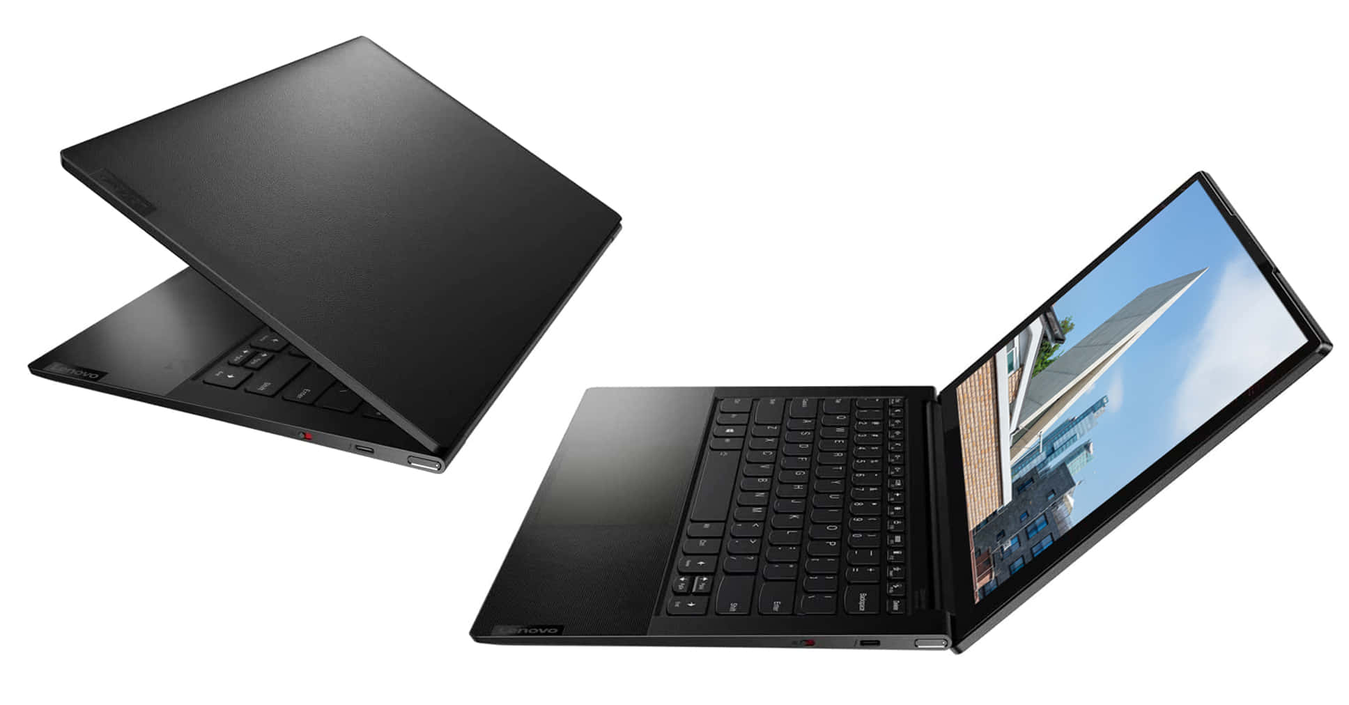 筆電 桌布 壁紙 — 兩部黑色 Lenovo 筆記型電腦在純白背景上展示打開和關閉狀態，其中一個螢幕顯示城市景觀。