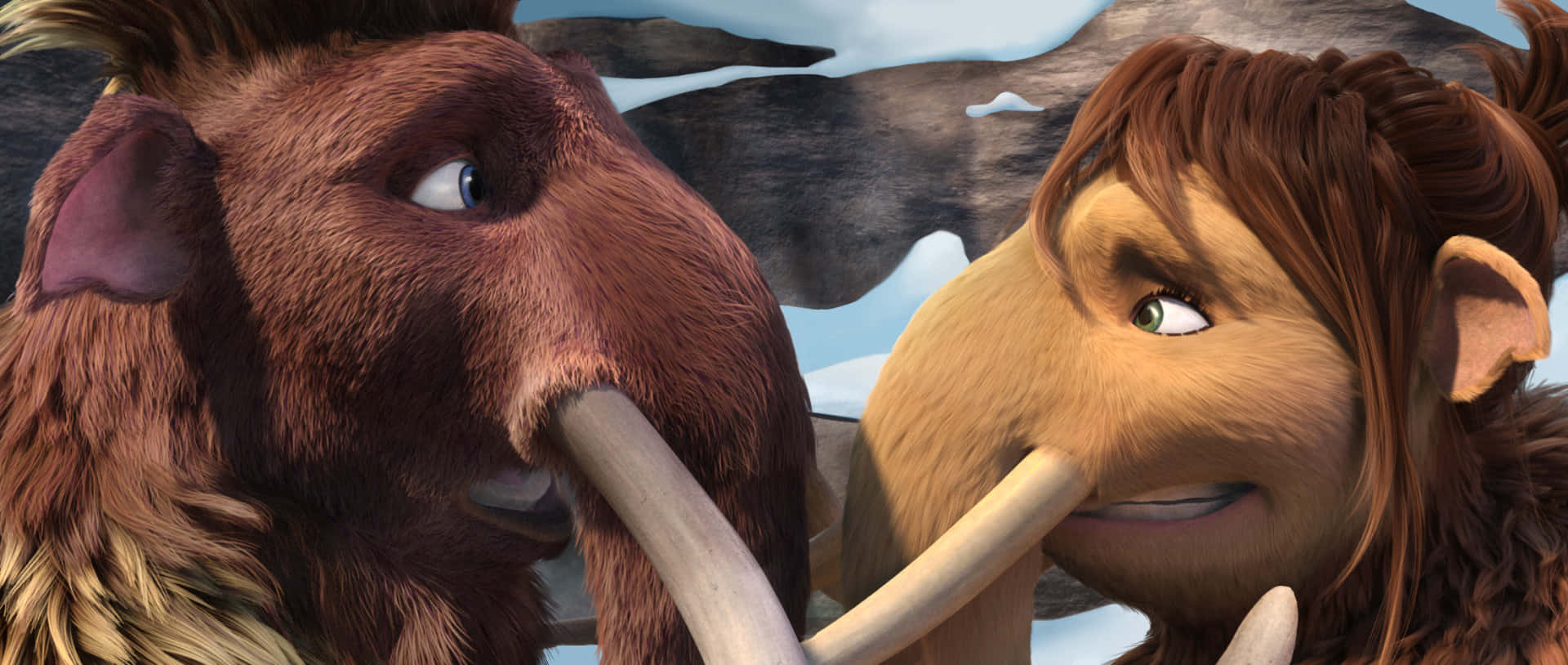 Ice Age 桌布 壁紙 — 兩隻動畫長毛猛獁象，擁有富有表情的眼睛和厚實的毛髮，在雪景背景下互相對望。