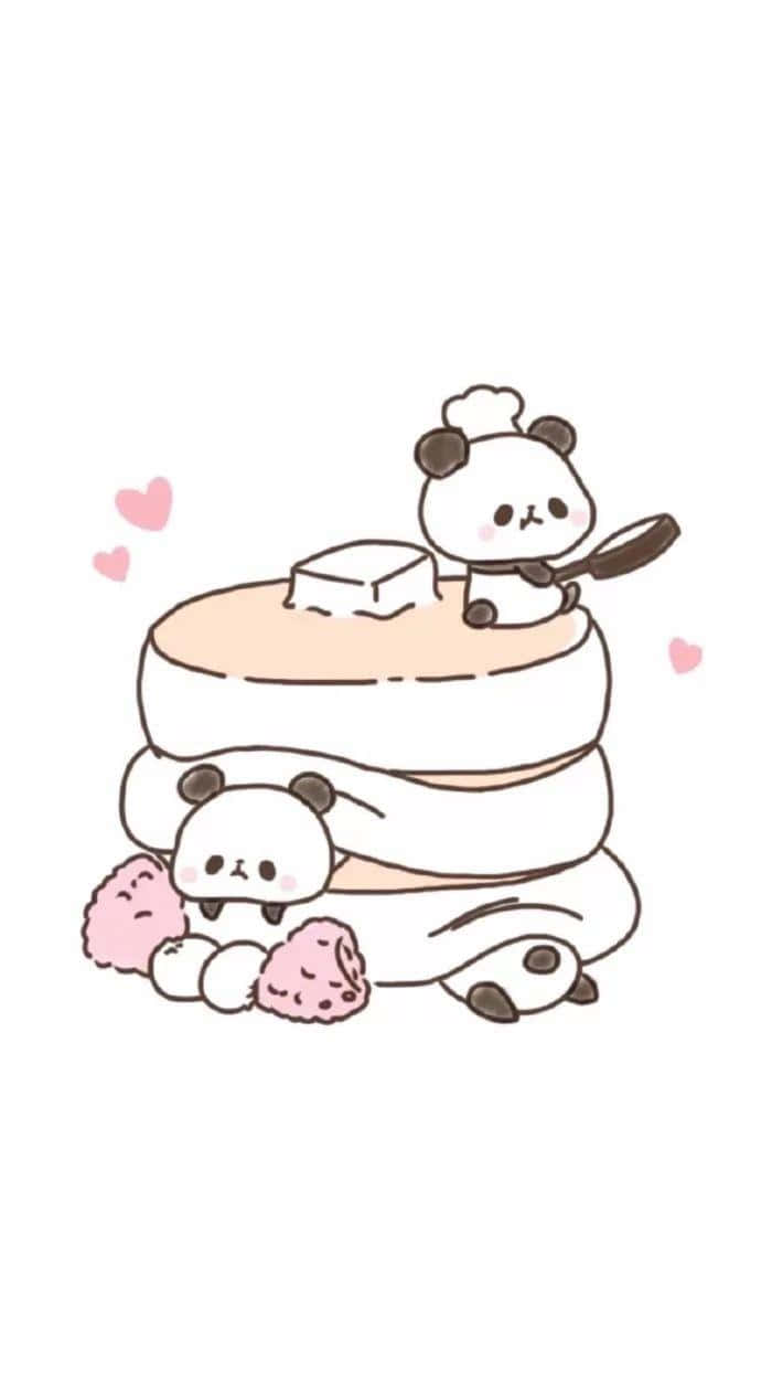 Cute Cartoon 桌布 壁紙 — 兩隻可愛熊貓，一隻在鬆餅堆上拿著鍋鏟，另一隻在下面，旁邊有粉紅色棉花糖和漂浮的心形。