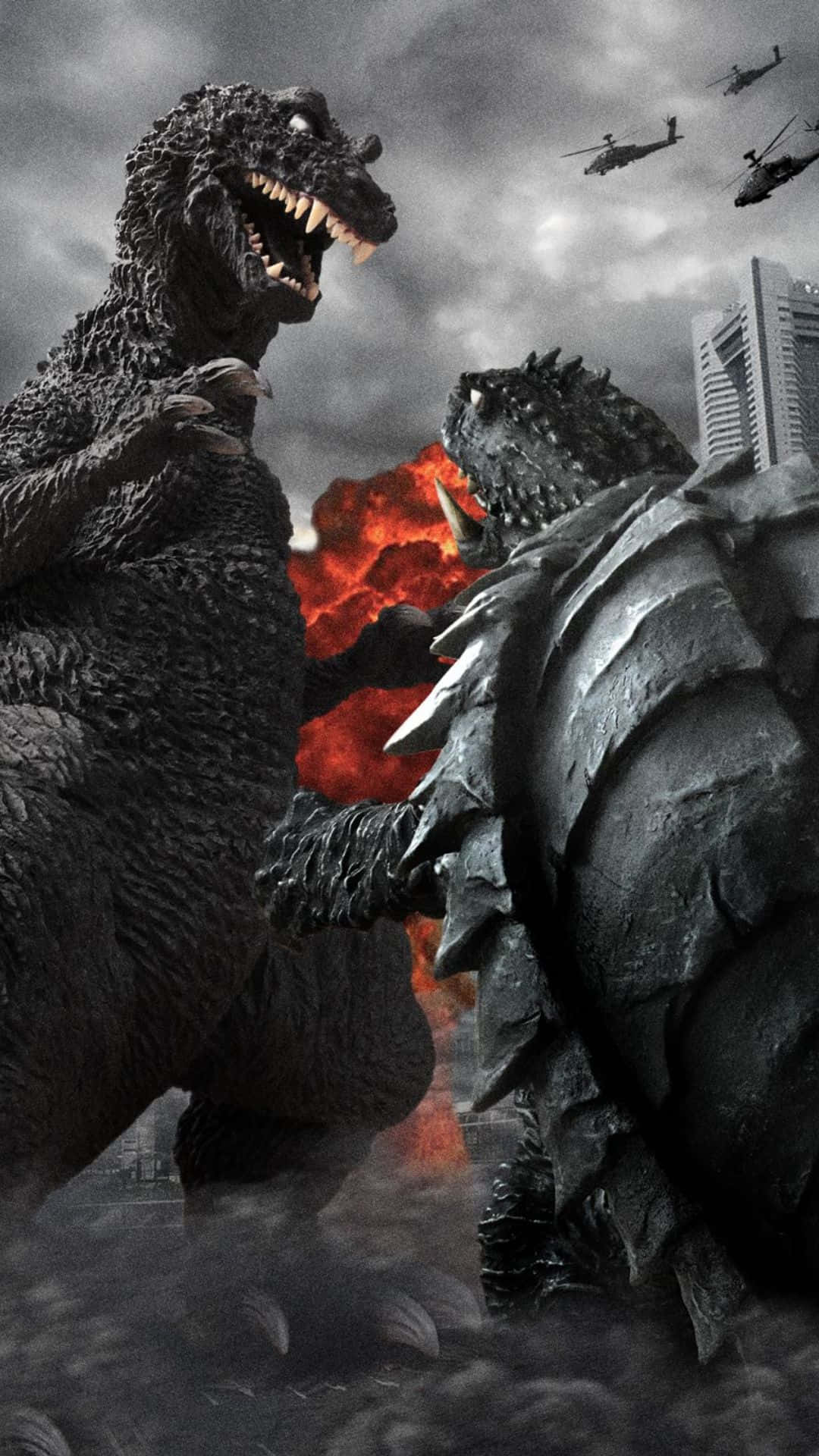 Godzilla Vs Gamera 桌布 壁紙 — 兩隻巨型怪物在烈火熊熊的城市戰場上碰撞，直升機在暴風雨的天空中飛過。