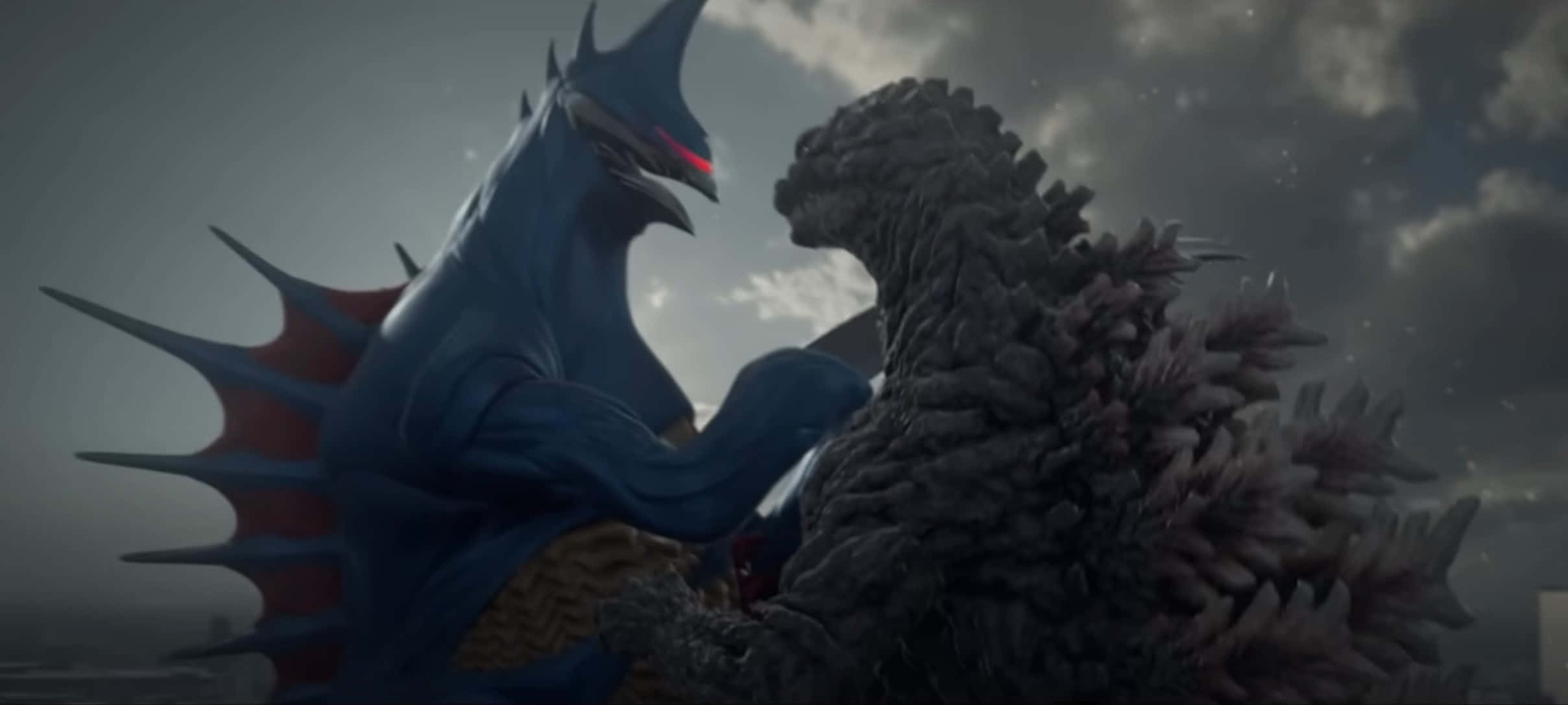 Godzilla Vs Gigan 桌布 壁紙 — 兩隻巨型怪獸在暴風雨的天空下碰撞，一隻藍色有紅色眼睛和尖刺，另一隻灰色有鋸齒狀背鰭。