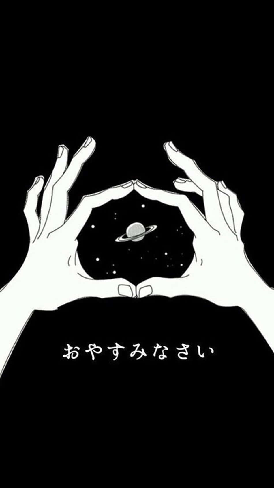 桌布 壁紙 — 兩隻手形成一個心形，框住一個帶有光環的小行星，背景是星光閃爍的黑色。