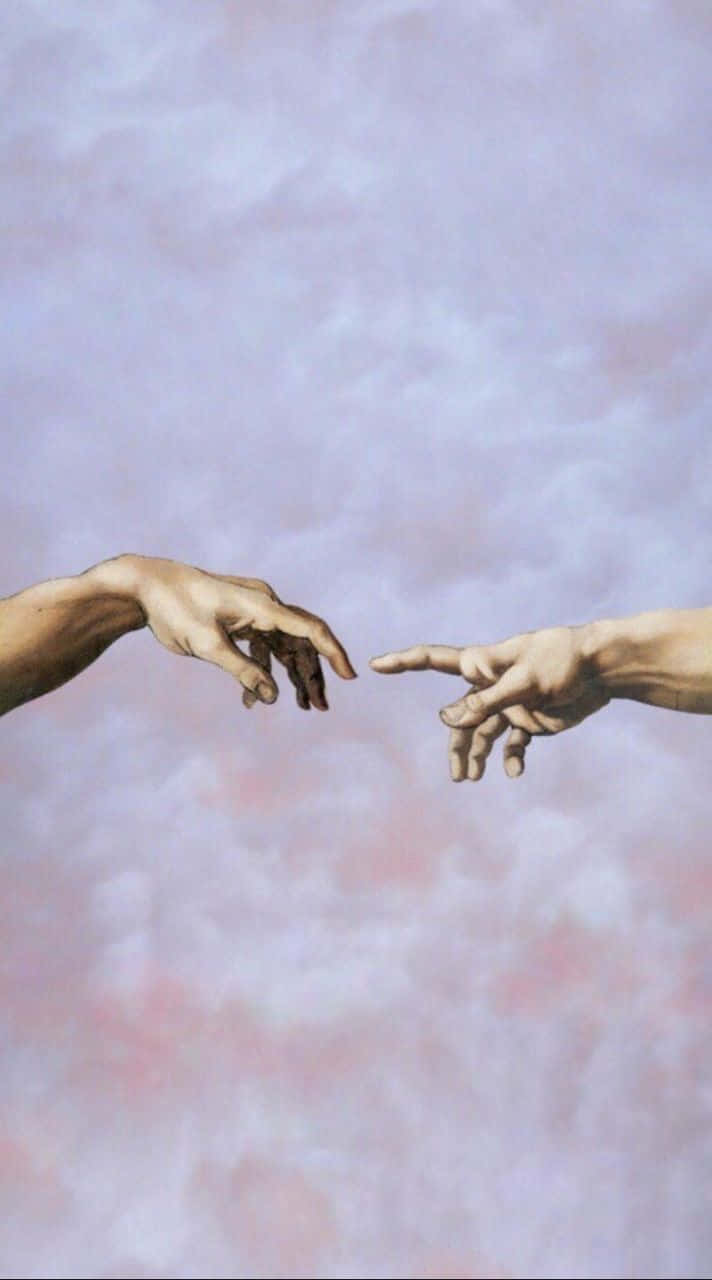 Renaissance 桌布 壁紙 — 兩隻手穿過柔軟多雲的天空伸出來，一隻神聖，一隻人類，即將觸碰指尖。