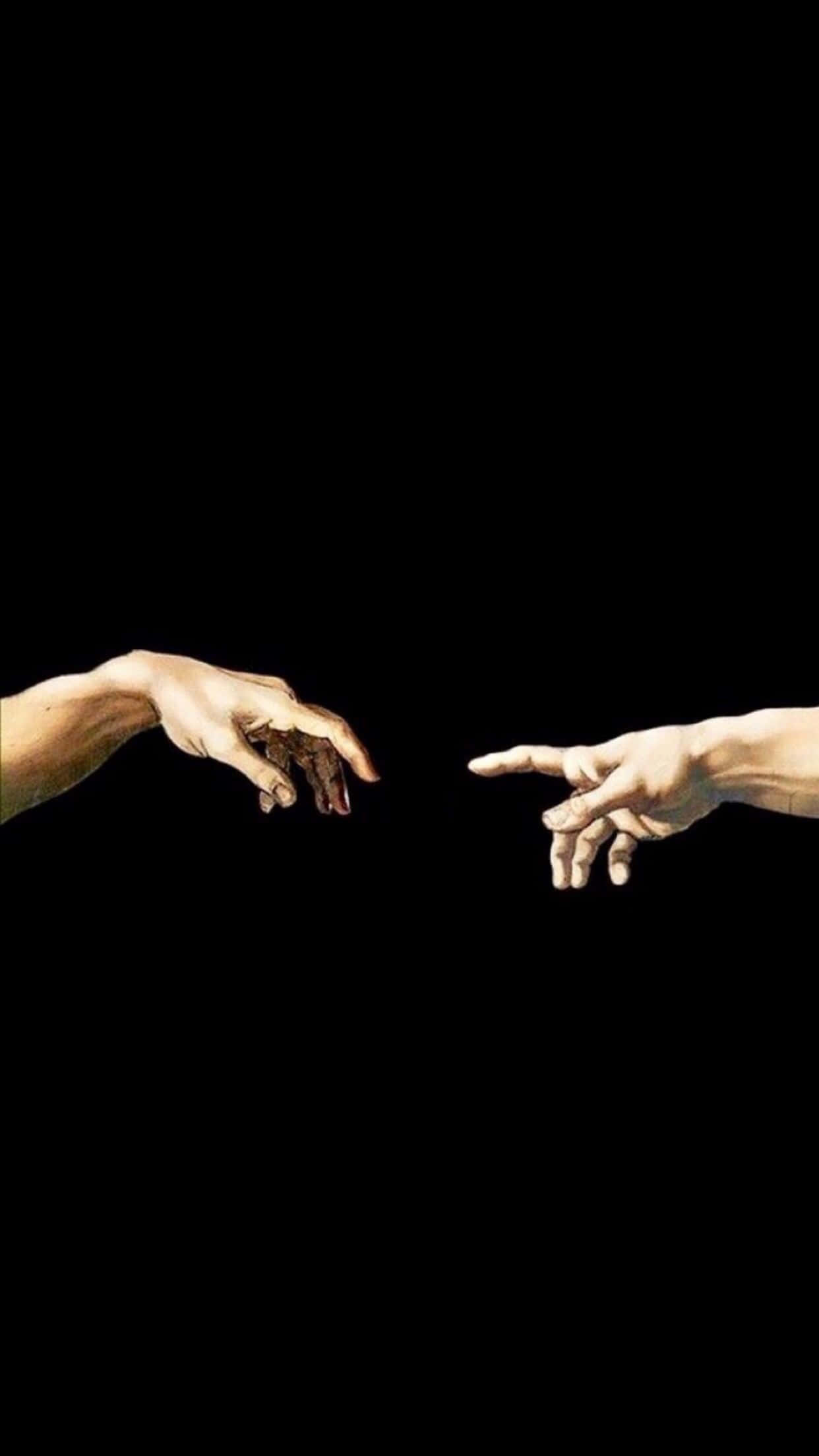 hand 桌布 壁紙 — 兩隻手越過黑色虛空伸出，一隻拇指變暗，另一隻食指指向，幾乎觸碰。