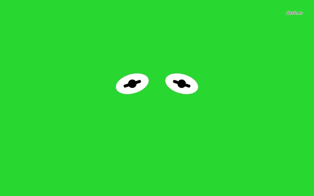 kermit 桌布 壁紙 — 兩隻極簡風格的白色眼睛，帶有黑色瞳孔，在純亮綠色背景上直視前方。