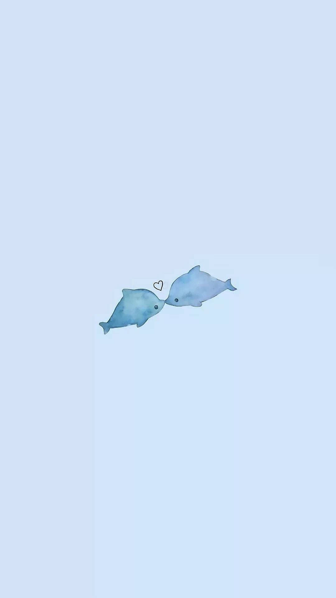 Whale 桌布 壁紙 — 兩隻藍色水彩海豚在柔和的粉藍色背景上依偎，中間有一個小愛心。