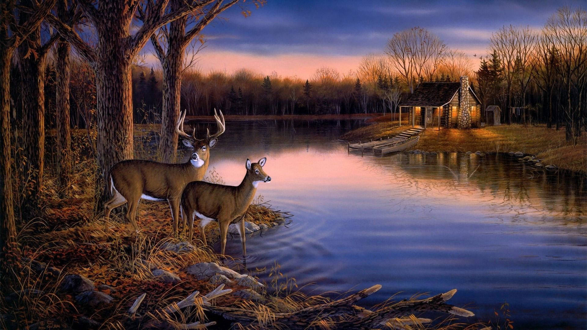 Deer Hunting 桌布 壁紙 — 兩隻鹿站在寧靜的湖邊，在黃昏時分，小屋的溫暖燈光映照著紫橙色的天空。
