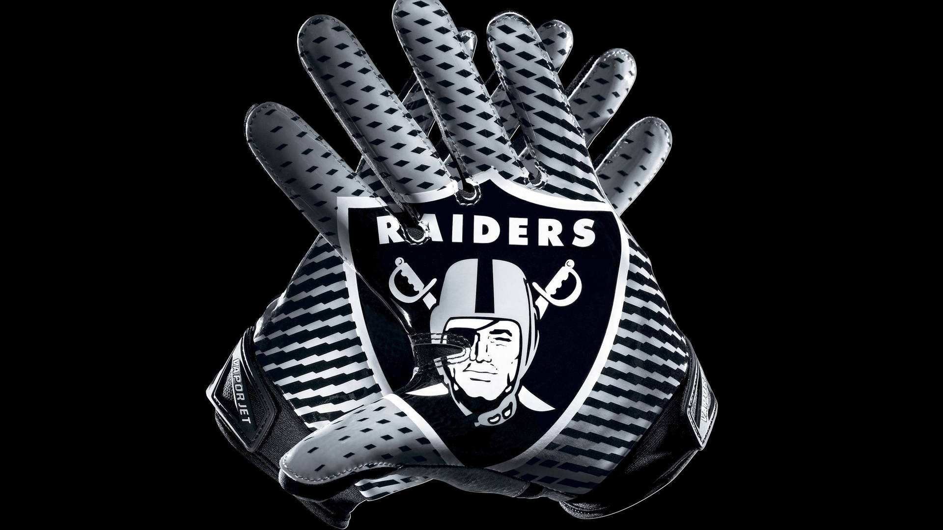 Raiders 美式足球手套，帶有球隊標誌，黑色背景 — 突襲者 GIF 壁紙