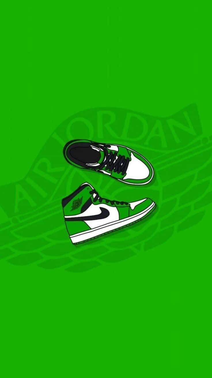 Dope Jordan 桌布 壁紙 — 兩雙綠色和白色的Air Jordan運動鞋漂浮在充滿活力的綠色背景上，帶有模糊的'AIR JORDAN'文字和胎面花紋。