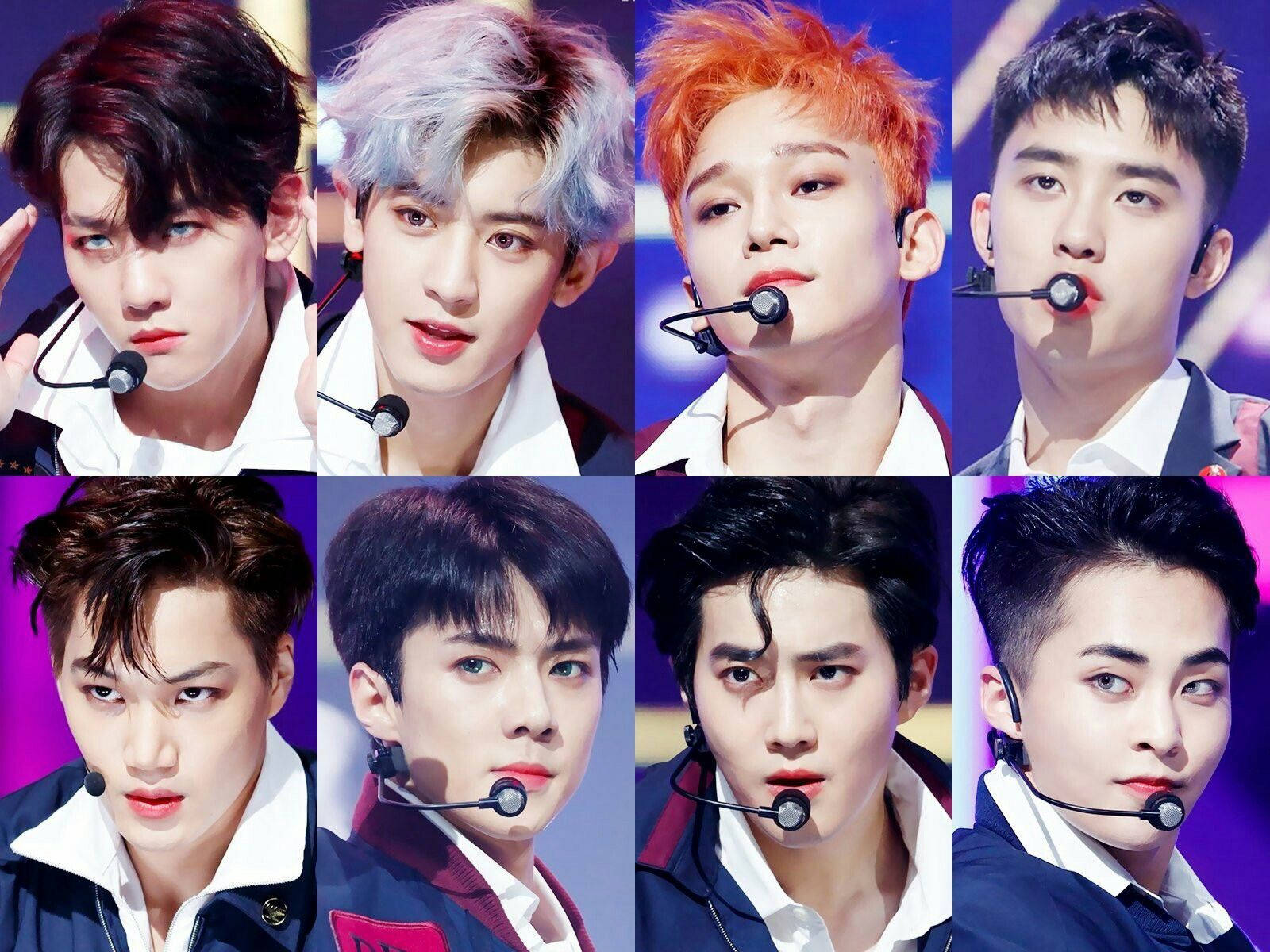 K-pop 桌布 壁紙 — 八位K-pop偶像以鮮豔的髮色和舞台麥克風，在色彩繽紛的燈光背景下擺姿勢。
