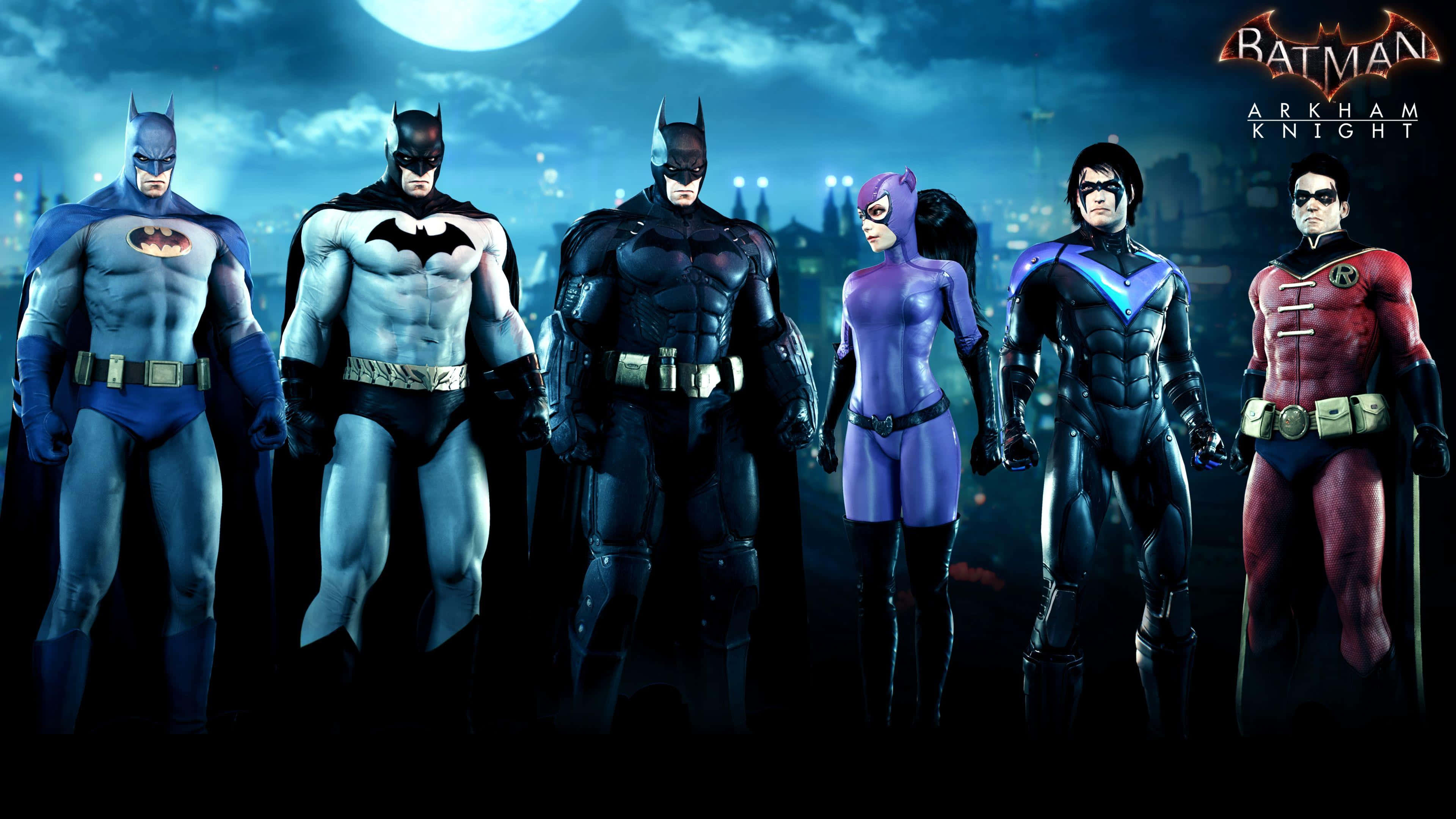 Bat-family 桌布 壁紙 — 六位蝙蝠俠盟友在發光的月亮下，以英雄姿態排成一列，背景是黑暗的城市天際線。