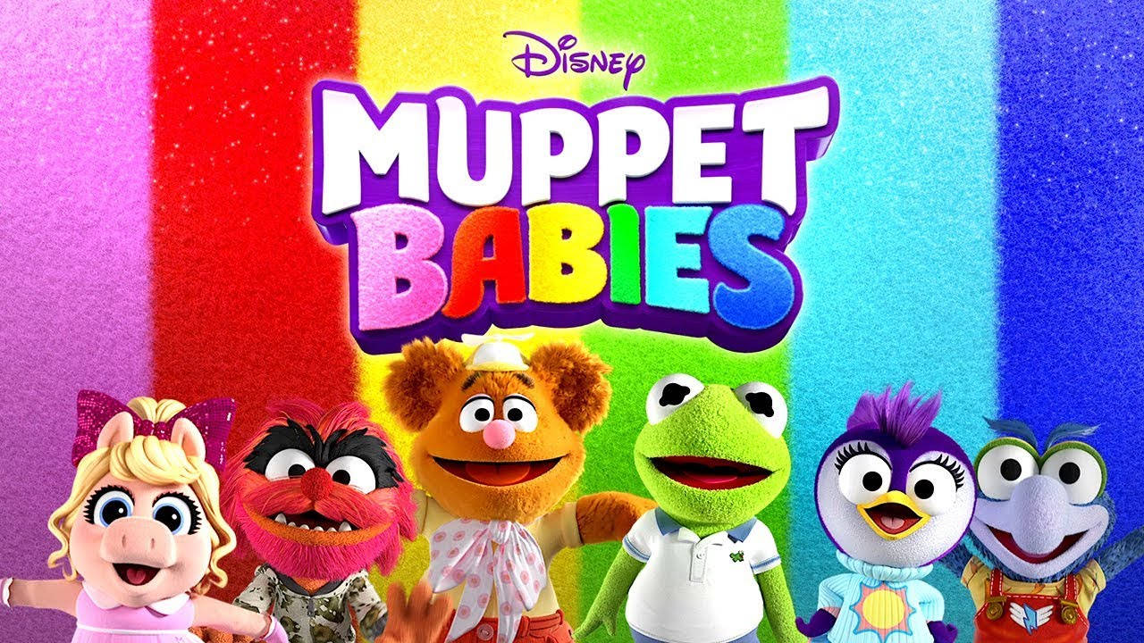 babies 桌布 壁紙 — 六個色彩繽紛的Muppet Babies玩偶在閃閃發光的彩虹背景和節目標題前開心微笑。