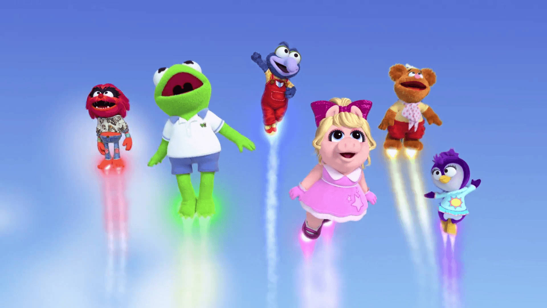 babies 桌布 壁紙 — 六個色彩繽紛的Muppet角色帶著歡樂的表情，在閃閃發光的噴射背包上翱翔於清澈的藍天中。