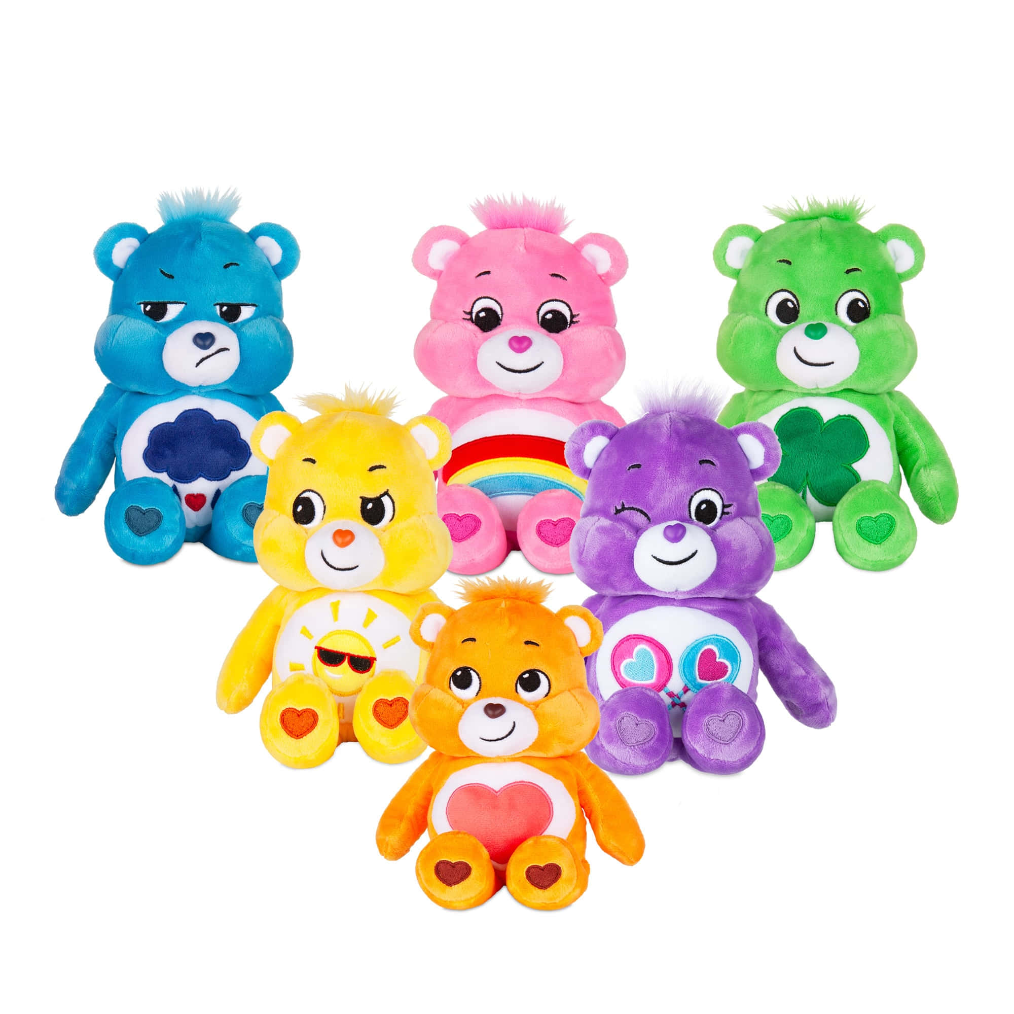 彩虹熊 桌布 壁紙 — 六個色彩繽紛的毛絨 Care Bears，帶有獨特的標誌和表情，在白色背景上以歡樂的群組排列。