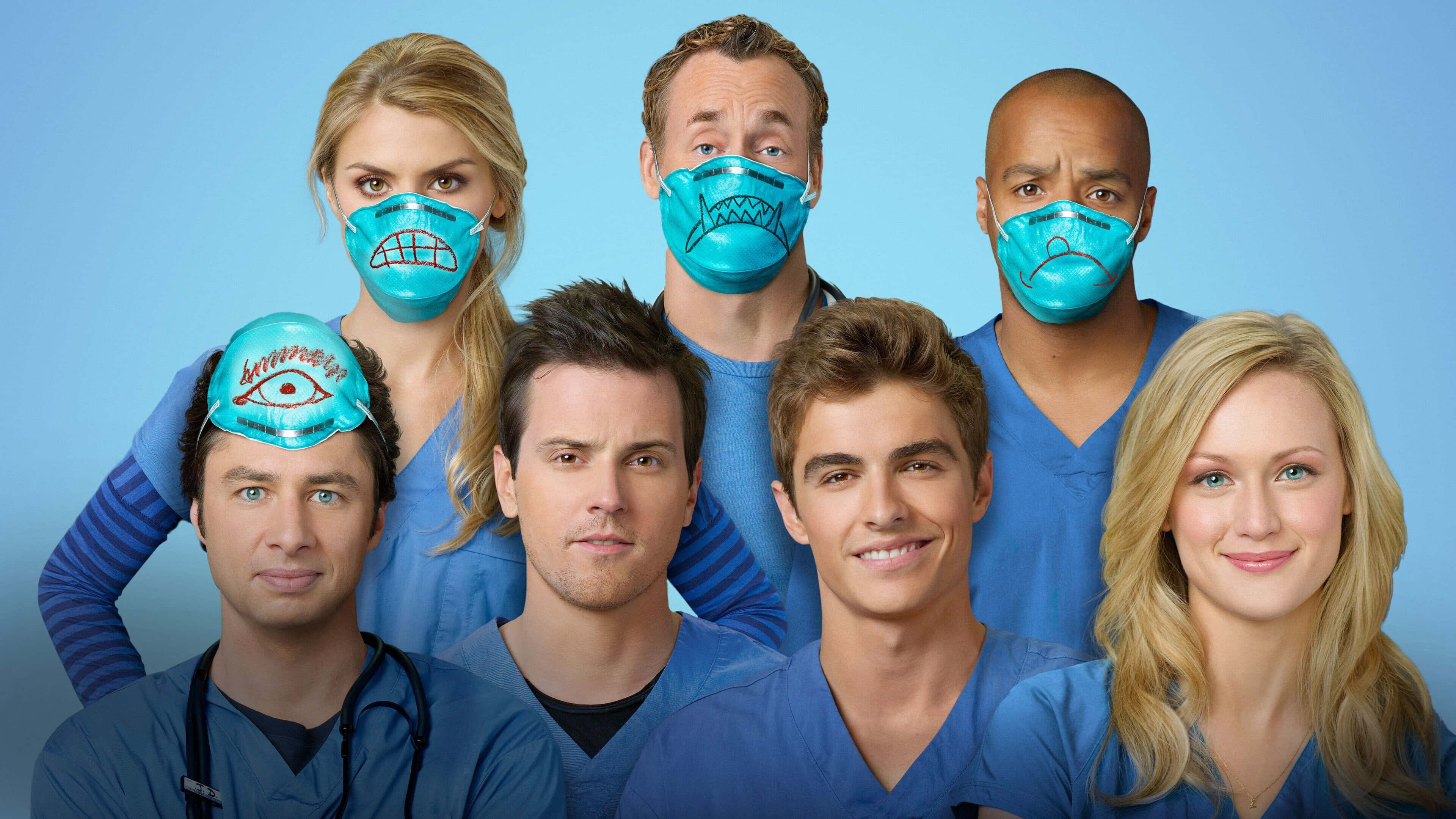 eliza coupe 桌布 壁紙 — 六名身穿藍色手術衣的醫護人員在純藍色背景前，臉上戴著俏皮的卡通面具。