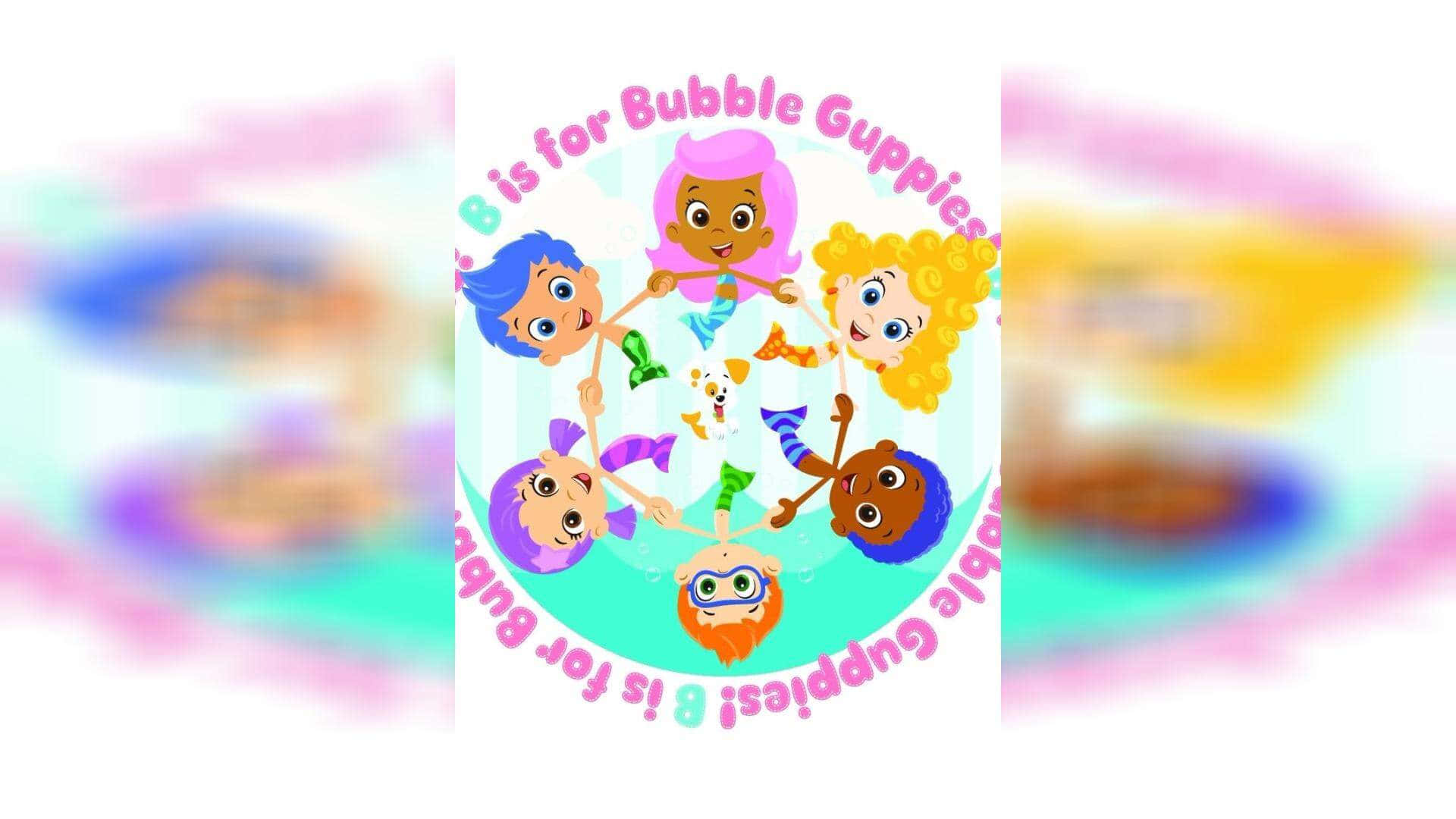 Bubble Guppies 桌布 壁紙 — 六條色彩繽紛的卡通孔雀魚，膚色多樣，在水下圍成一個圓圈手牽手，周圍有文字「B is for Bubble Guppies」。
