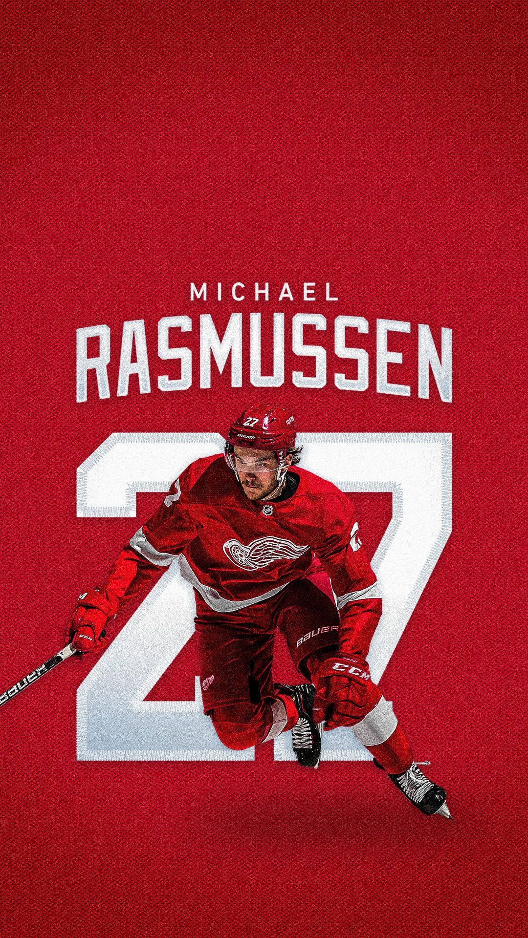 detroit 桌布 壁紙 — 冰球運動員 Michael Rasmussen 身穿紅色球衣，在鮮紅色背景上動態滑行，背號27。