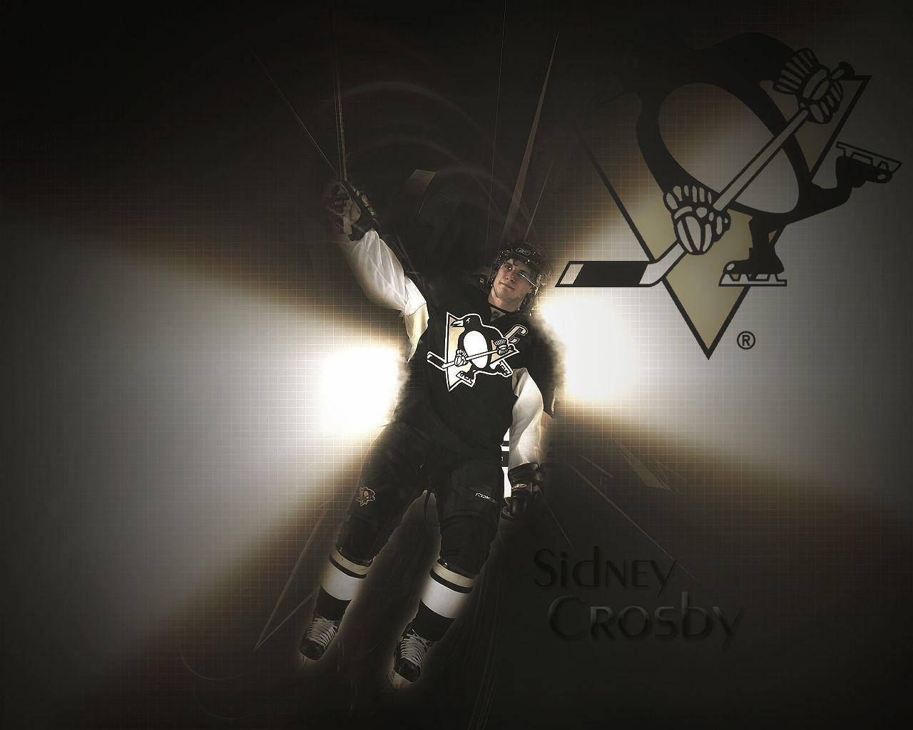 photography 桌布 壁紙 — 冰球運動員 Sidney Crosby 身穿黑色和金色球衣，在黑暗背景中配合聚光燈和球隊標誌動態跳躍。