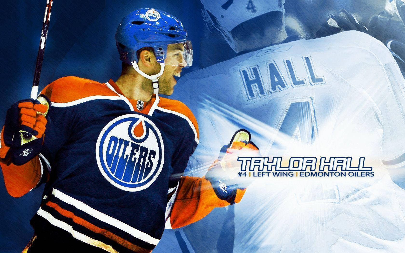 hockey 桌布 壁紙 — 冰球運動員Taylor Hall身穿埃德蒙頓油人隊裝備，在發光藍色背景前用球棍慶祝。