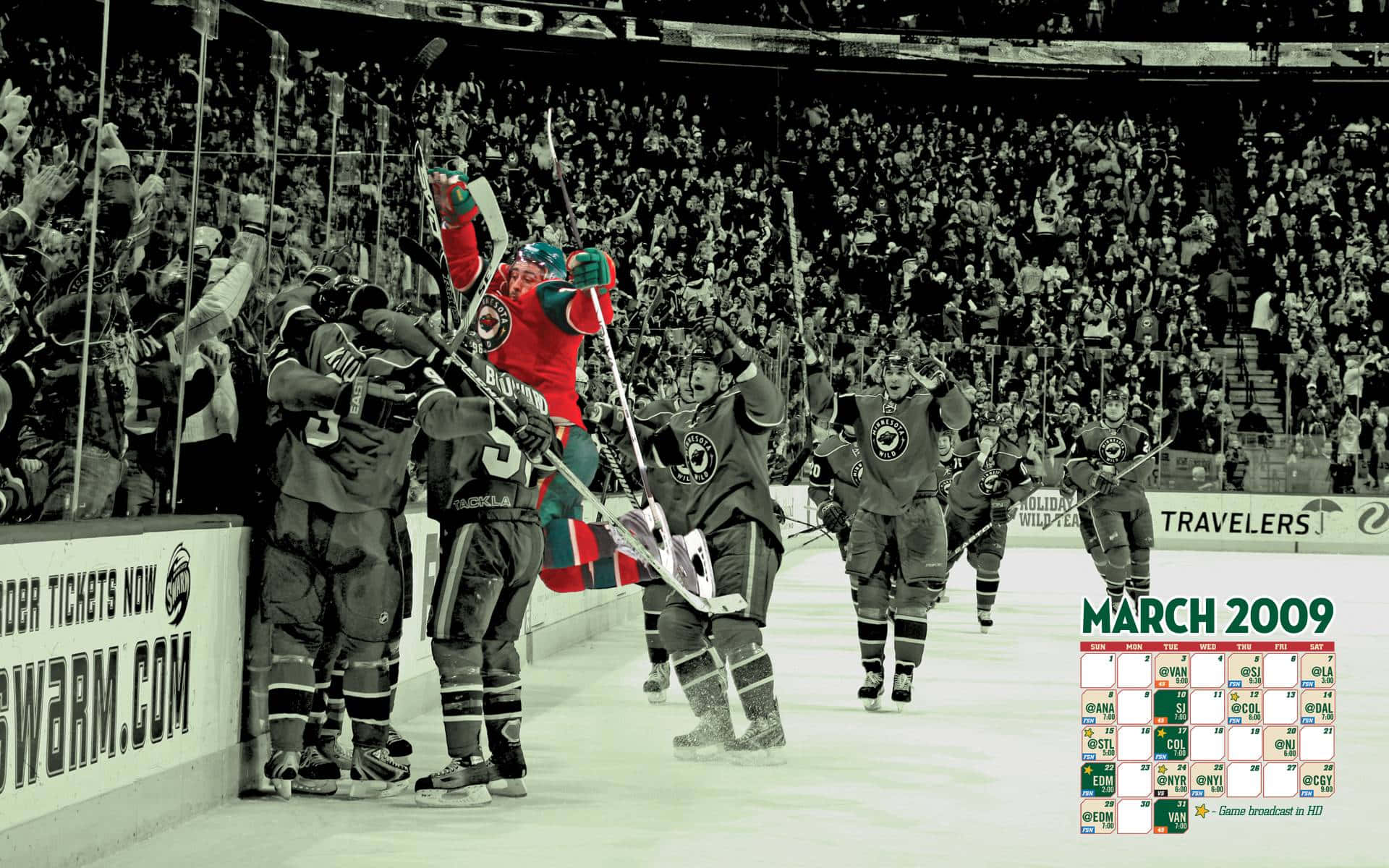 hockey 桌布 壁紙 — 冰球運動員在冰場上以黑白搭配選擇性紅色慶祝進球。