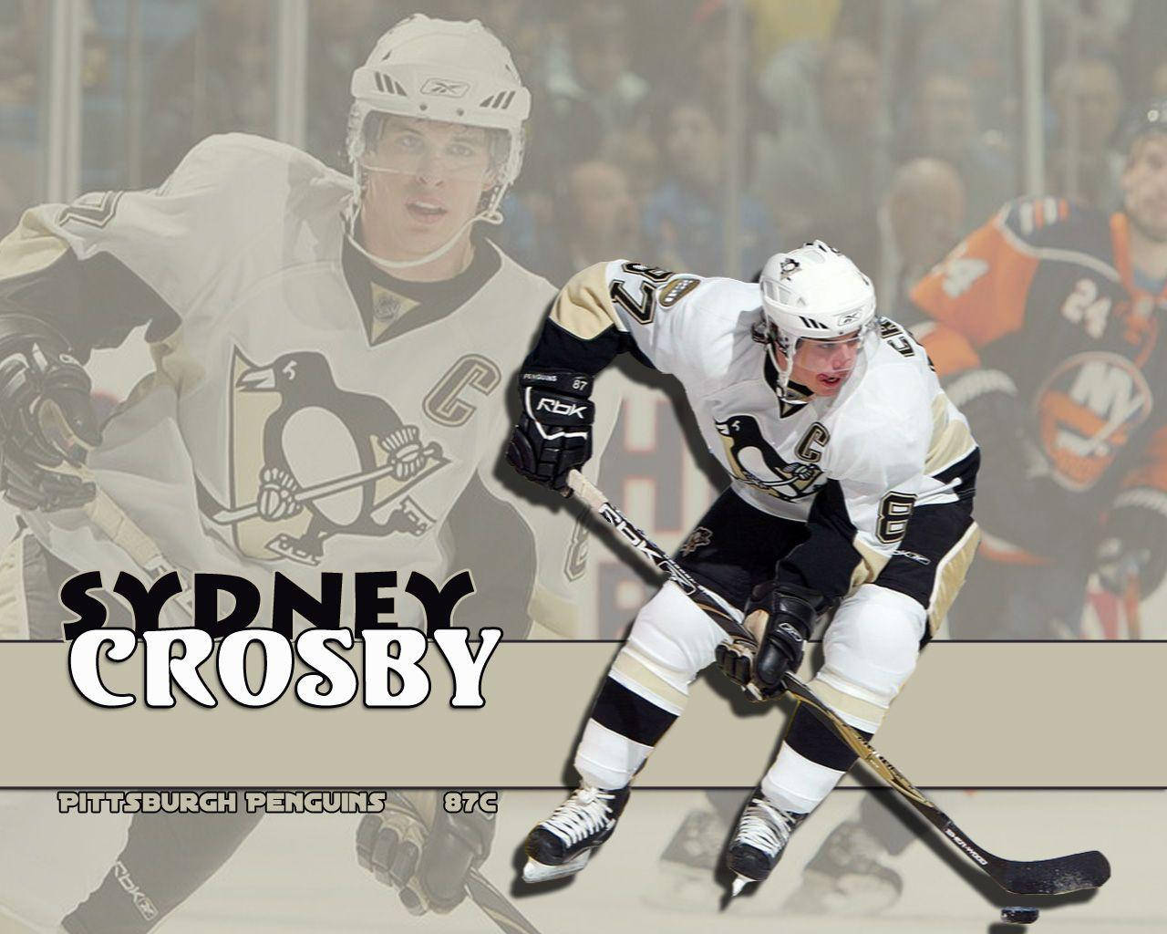 運動 桌布 壁紙 — 冰球運動員雪梨·克羅斯比（Sydney Crosby）身穿匹茲堡企鵝隊裝備，身後是模糊的人群。