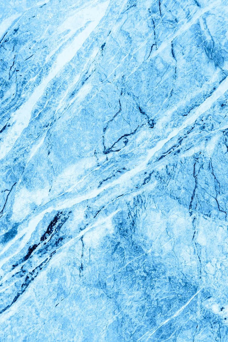 texture 桌布 壁紙 — 冷色調藍白大理石的近距離特寫，帶有複雜紋理和質感表面。