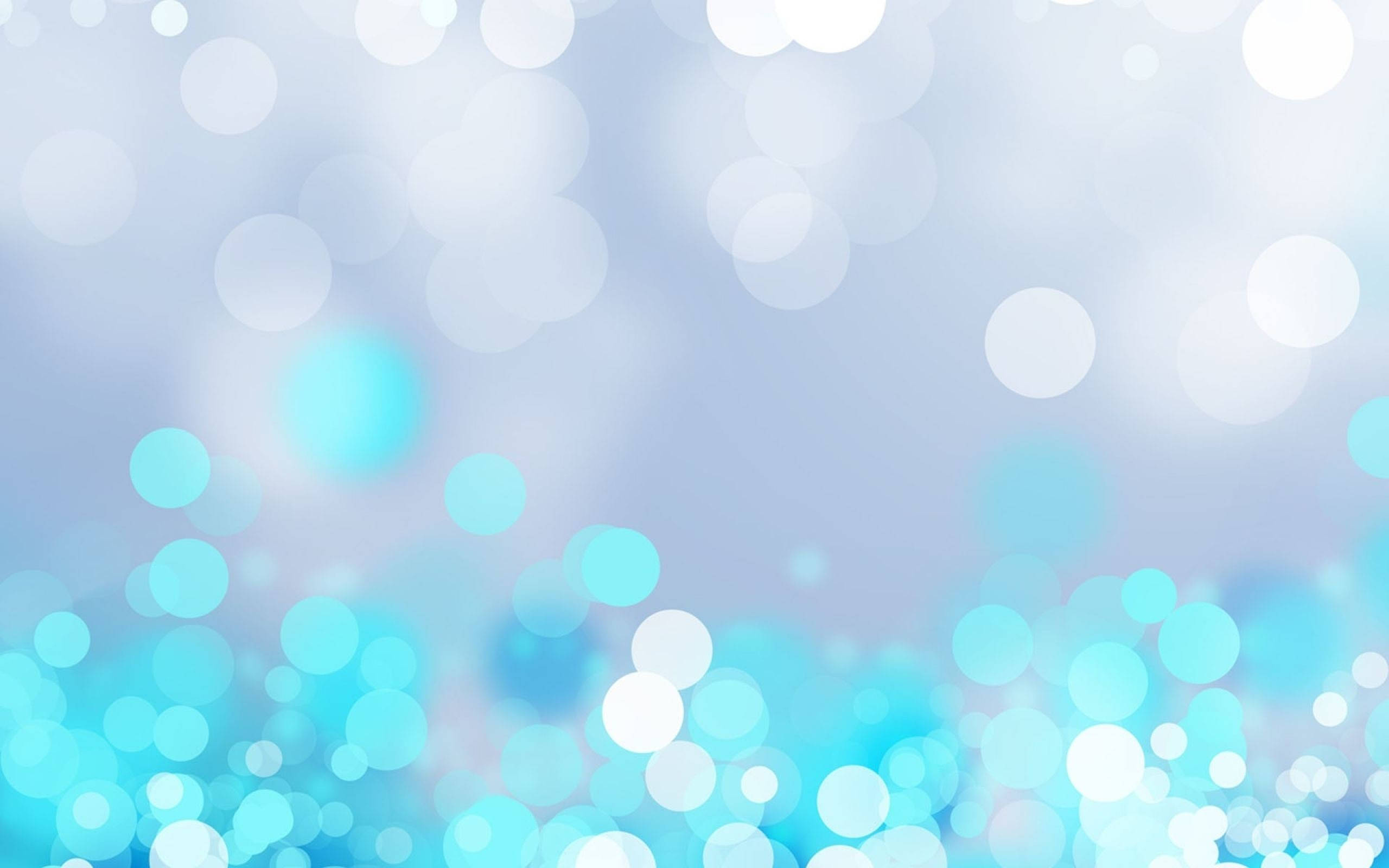 Bokeh 桌布 壁紙 — 冷藍色和白色的柔和發光散景圓圈，營造出帶有柔和光暈的夢幻抽象背景。
