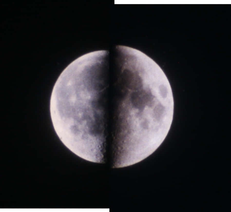 Perigee 桌布 壁紙 — 分裂的月亮顯示一半被照亮，一半在陰影中，背景是黑色天空。