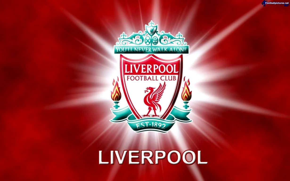 Liverpool Fc Desktop 桌布 壁紙 — 利物浦足球俱樂部徽章在深紅色紋理背景上散發出明亮的白色光束。