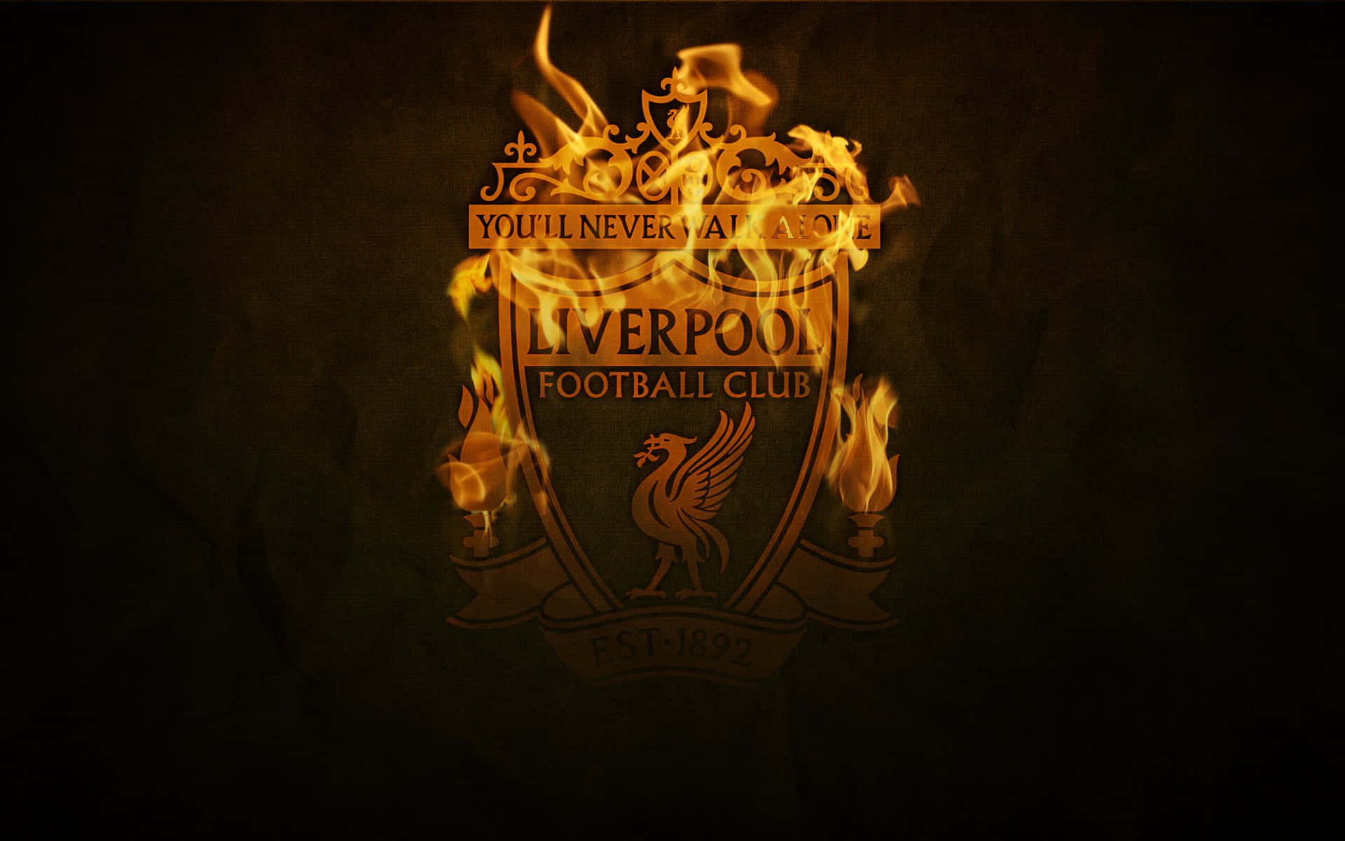 Liverpool Logo 桌布 壁紙 — 利物浦足球俱樂部徽章在深色紋理背景上被熊熊火焰吞噬。