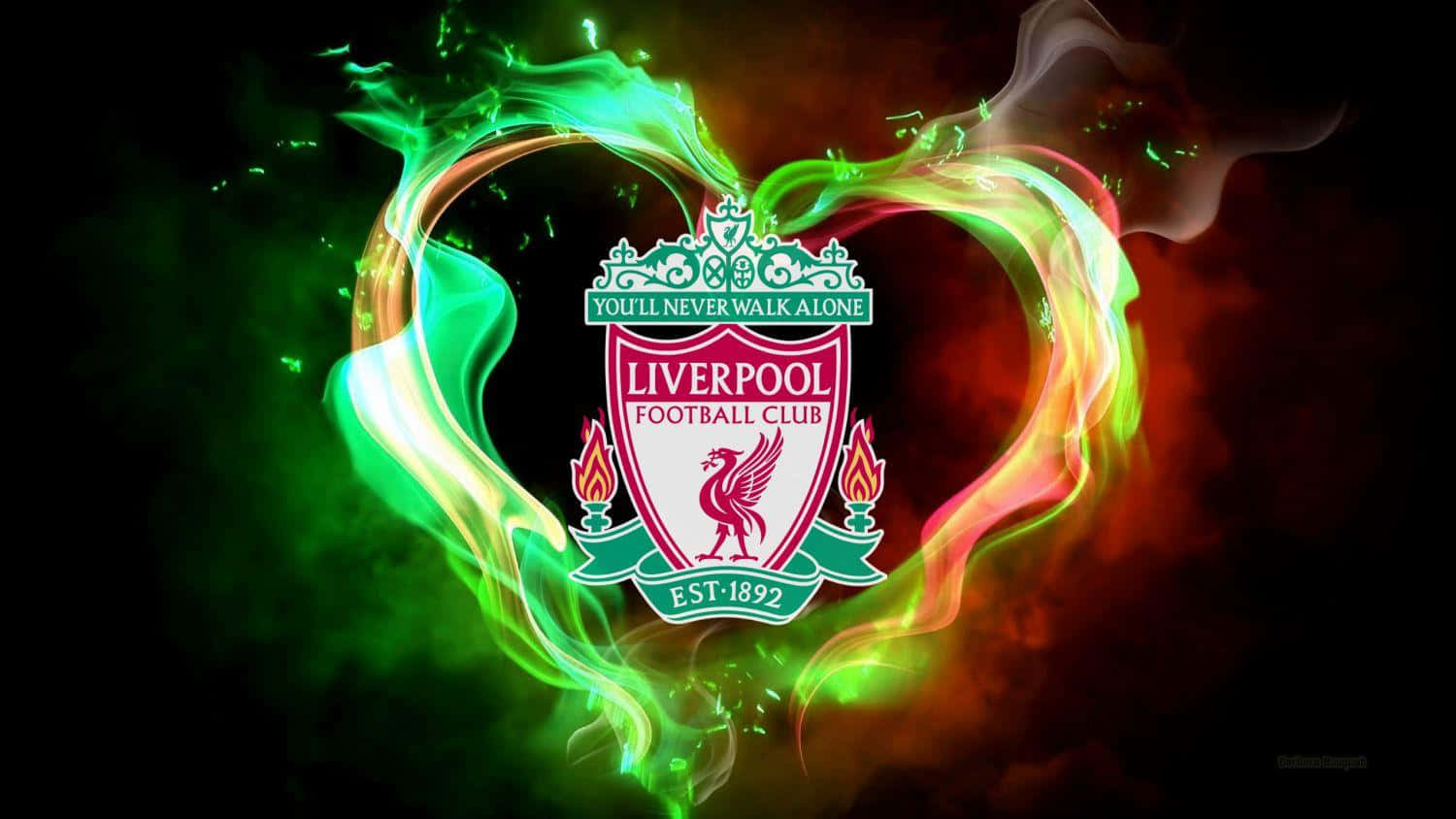 Liverpool Fc Desktop 桌布 壁紙 — 利物浦足球俱樂部徽章在深色背景上，於充滿活力的綠色和紅色心形能量漩渦中發光。