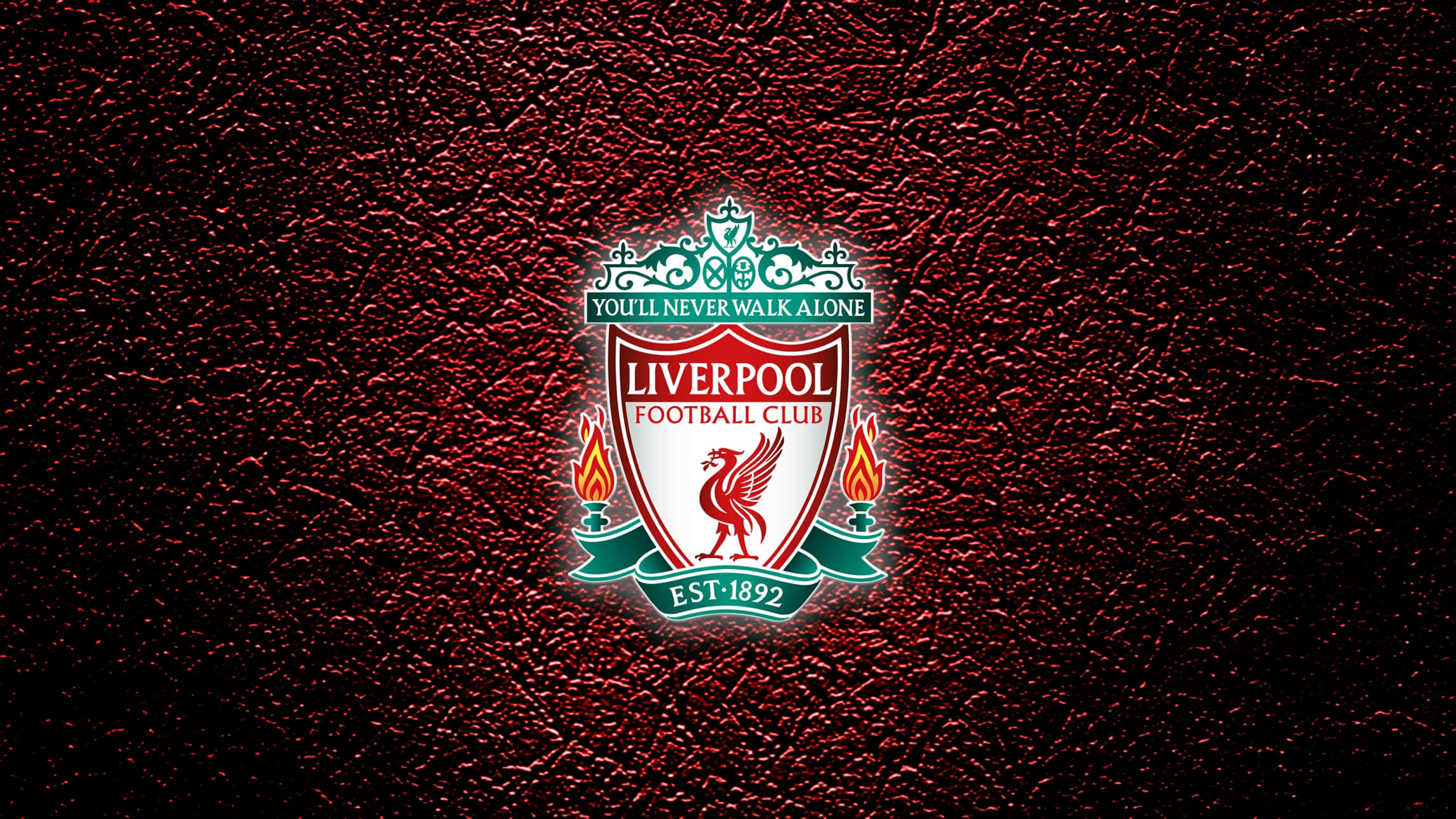 Liverpool Logo 桌布 壁紙 — 利物浦足球俱樂部徽章在質感深紅色皮革背景上發出紅綠光芒。