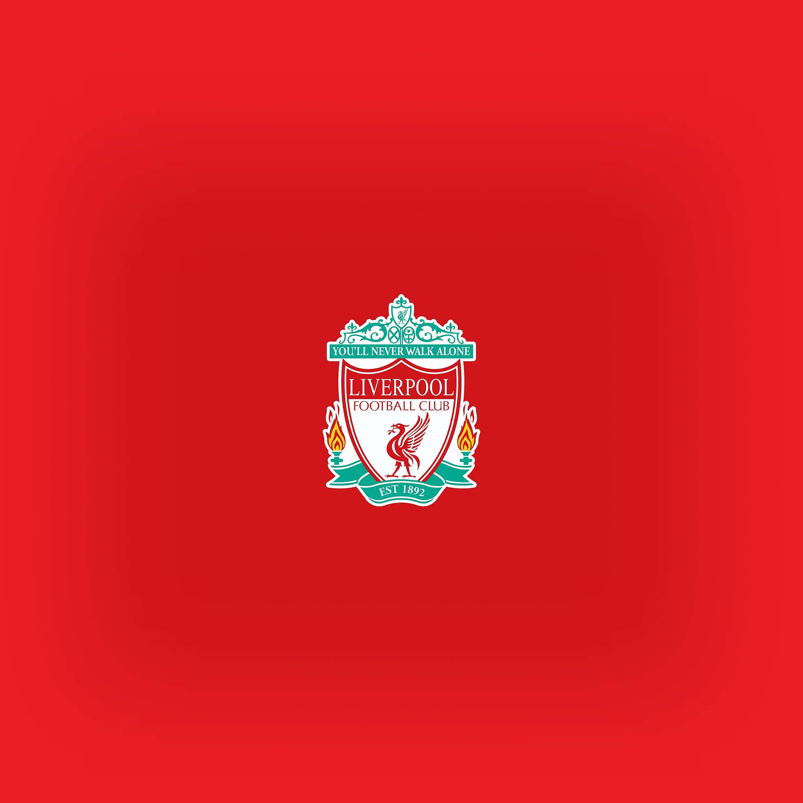 Liverpool Logo 桌布 壁紙 — 利物浦足球會徽章居中於充滿活力的紅色漸變背景上，配有火焰和格言。