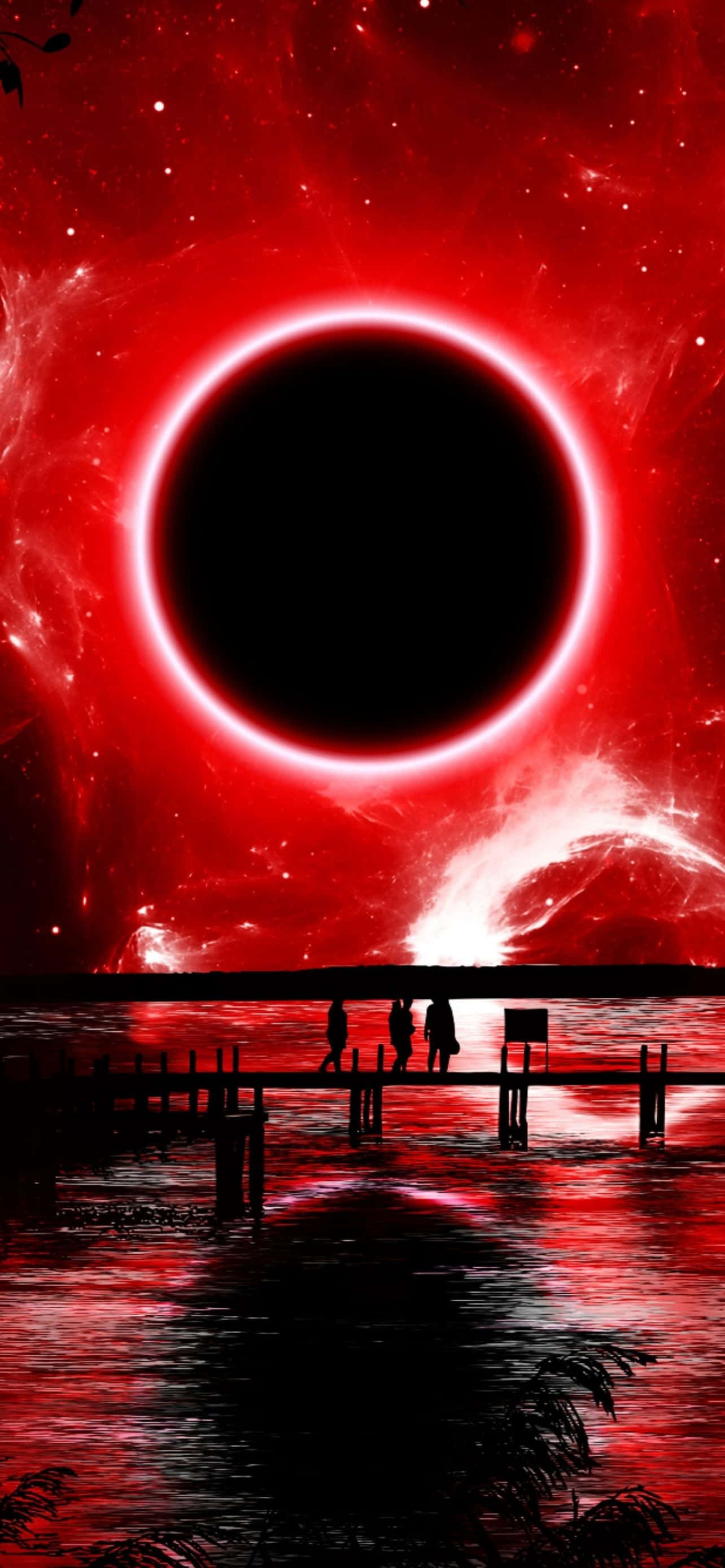 酷炫iPhone 桌布 壁紙 — 剪影人物在血紅色水中倒映的熾熱紅色宇宙日食下走過碼頭。