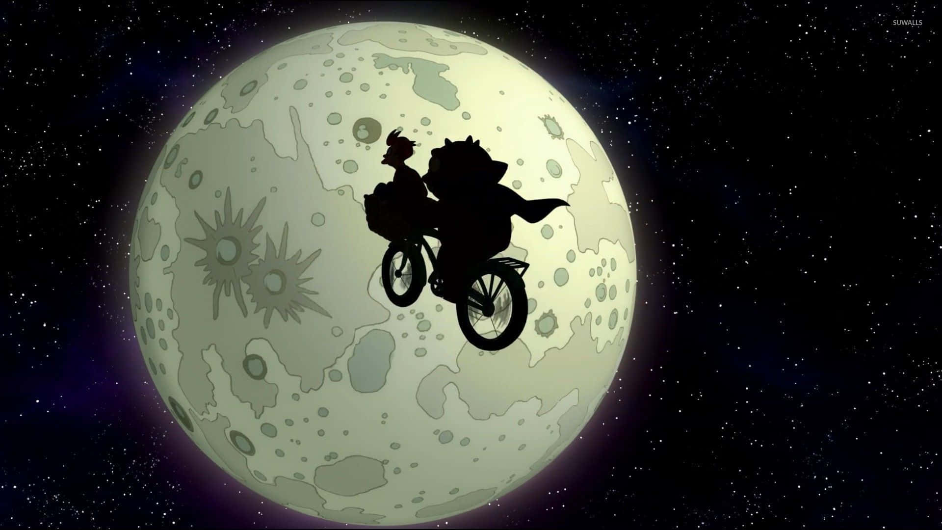 Et 桌布 壁紙 — 剪影單車手在繁星點點的夜空下，飛越巨大的月亮。