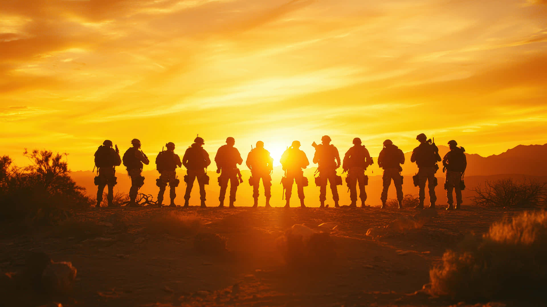 A group of soldiers stands in silhouette against a glowing sunset, symbolizing unity and duty 壁紙 — 剪影士兵在沙漠景觀中排成一線，襯托著鮮豔的橙色日落。