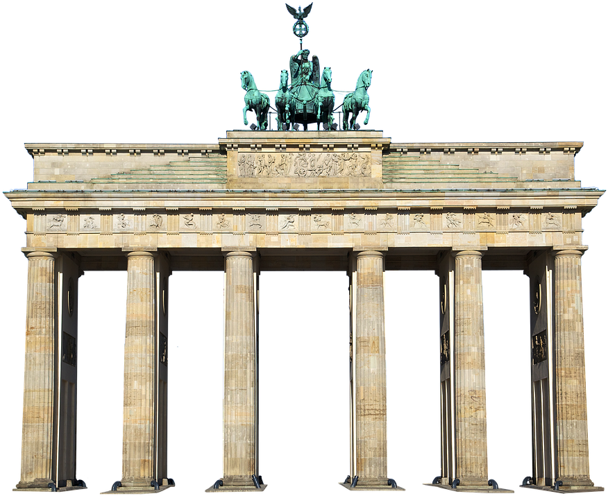 Berlin 桌布 壁紙 — 勃蘭登堡門高聳矗立，以其標誌性的新古典主義柱子和頂上的四馬戰車雕像，沐浴在明亮的日光中。