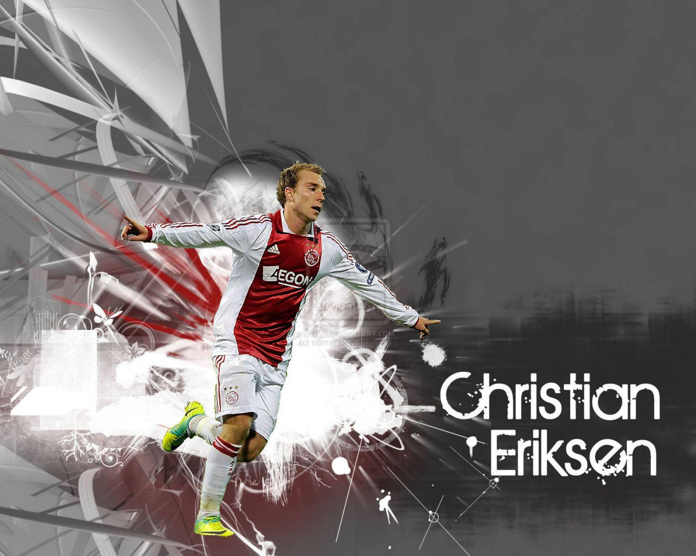 足球 桌布 壁紙 — 動態足球員 Christian Eriksen 身穿紅白球衣，在抽象動態圖形中行動。