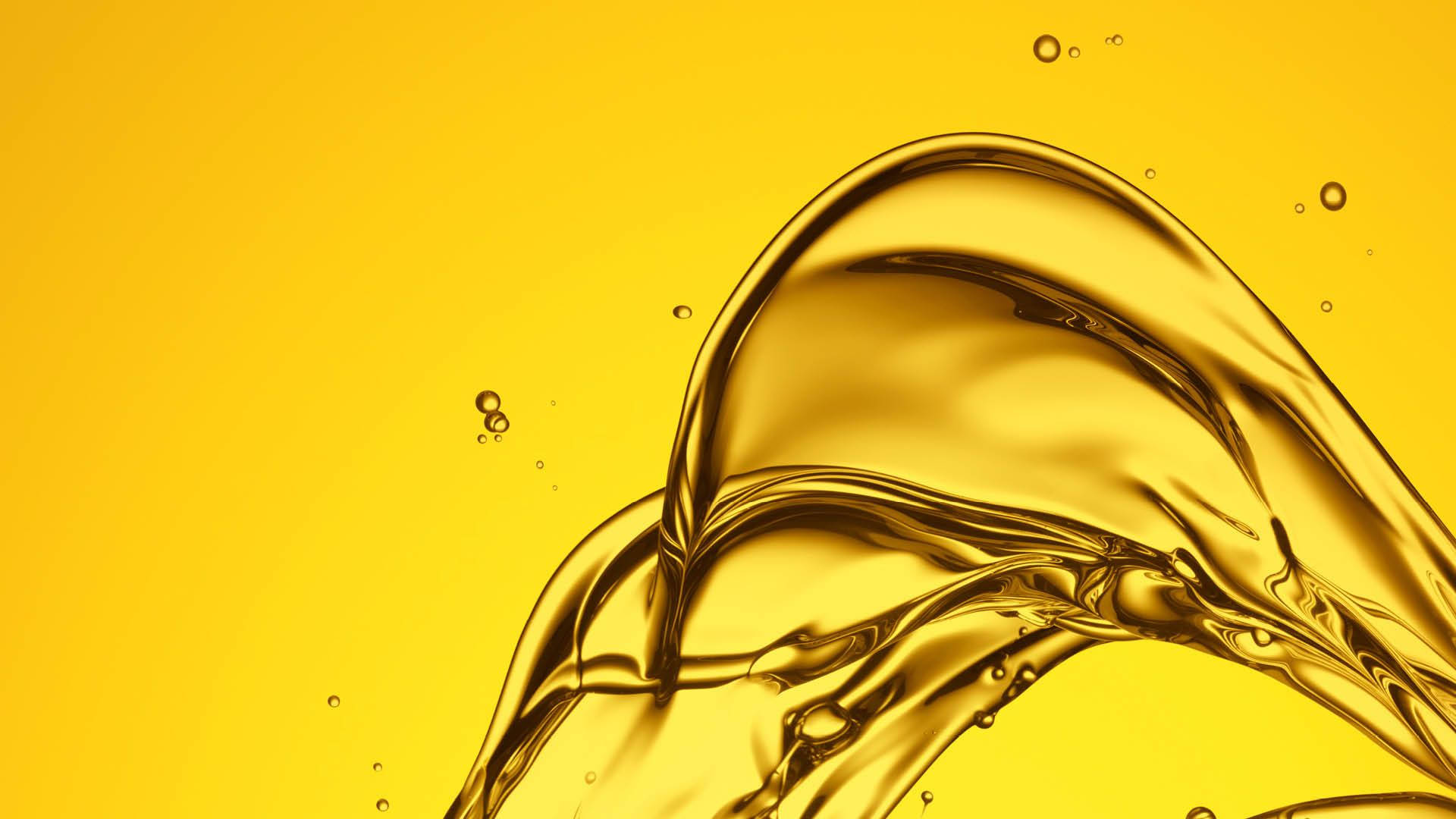 Oil 桌布 壁紙 — 動態金色液體飛濺在純黃色背景上優雅地彎曲，帶有漂浮的液滴。