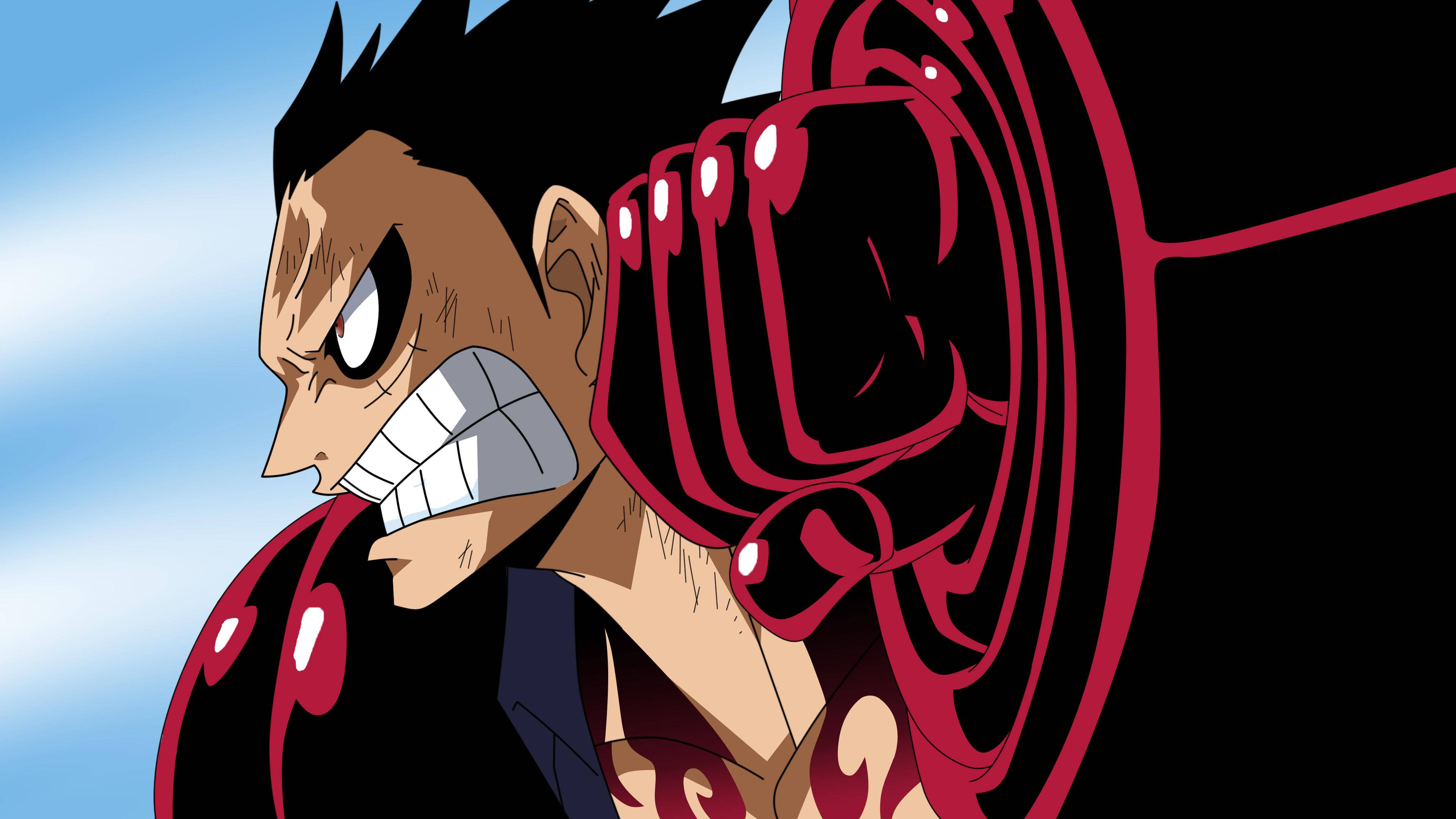 luffy 4K 桌布 壁紙 — 動漫角色，黑色刺蝟頭，紅色手臂裝甲，在藍天背景下露出牙齒。