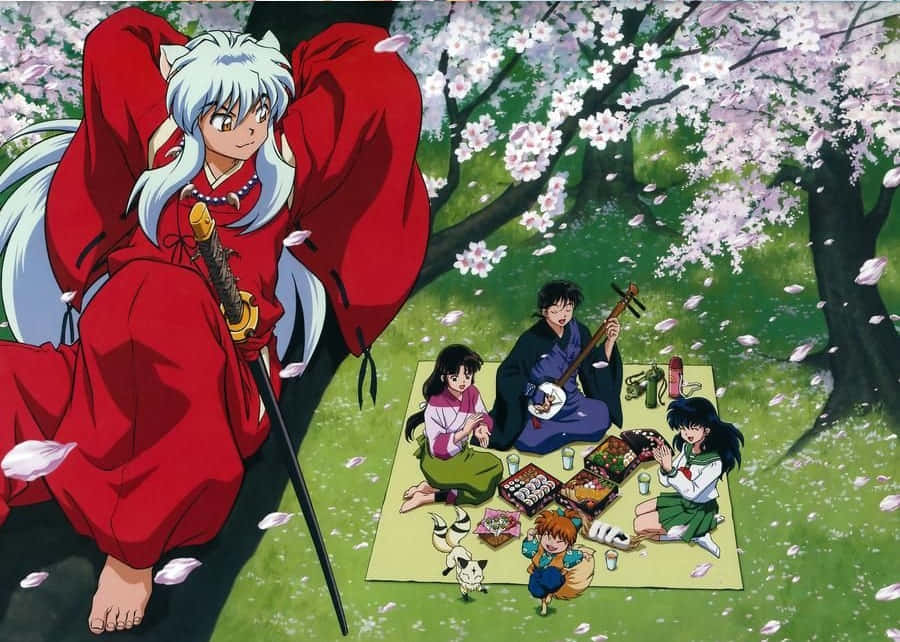 Inuyasha And The Gang 桌布 壁紙 — 動漫角色在盛開的櫻花樹下享受野餐，花瓣飄落。