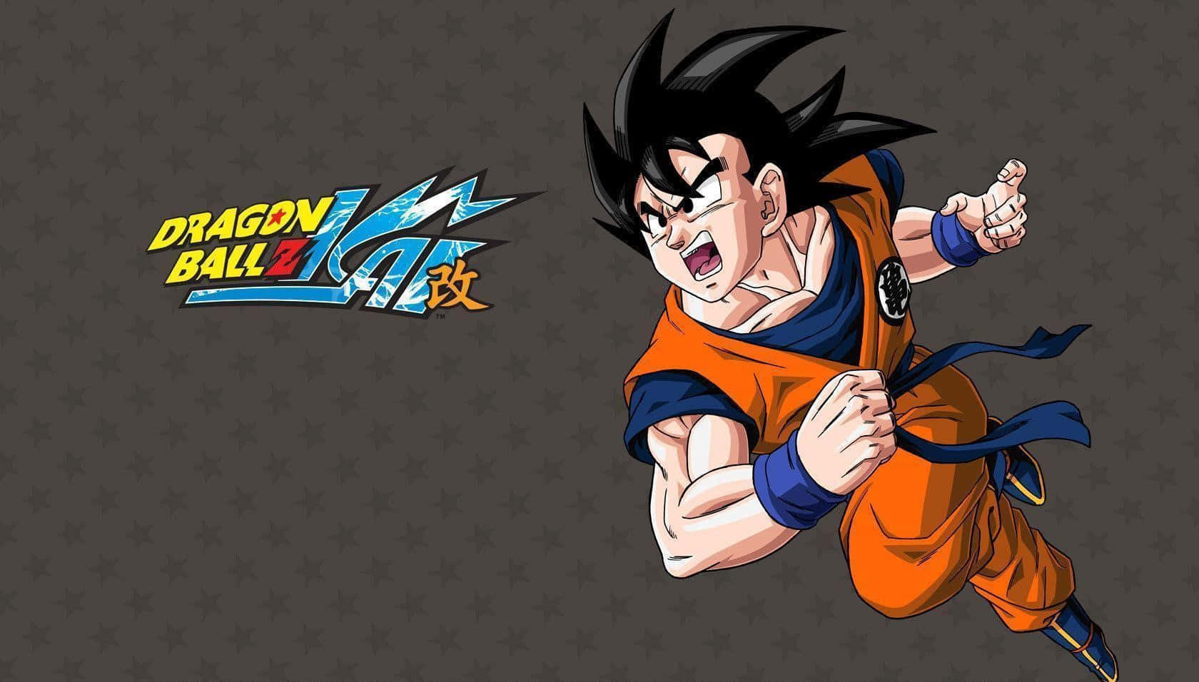 Dragon Ball Z Kai 桌布 壁紙 — 動漫角色悟空身穿橙色道服，在灰色星星圖案背景上動態跳躍，並帶有七龍珠Z標誌。