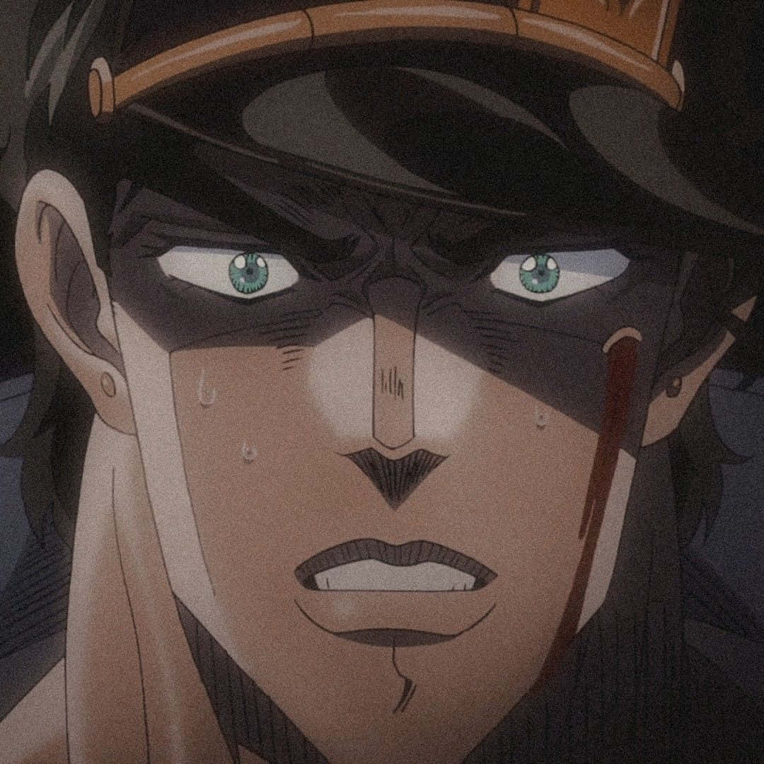 Jotaro 桌布 壁紙 — 動漫角色特寫，綠色眼睛，帽下臉頰滴血。
