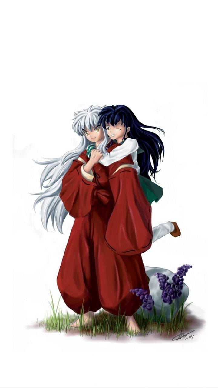 Inuyasha 桌布 壁紙 — 動漫角色犬夜叉和戈薇在長滿紫色花朵的草地上溫暖地擁抱。